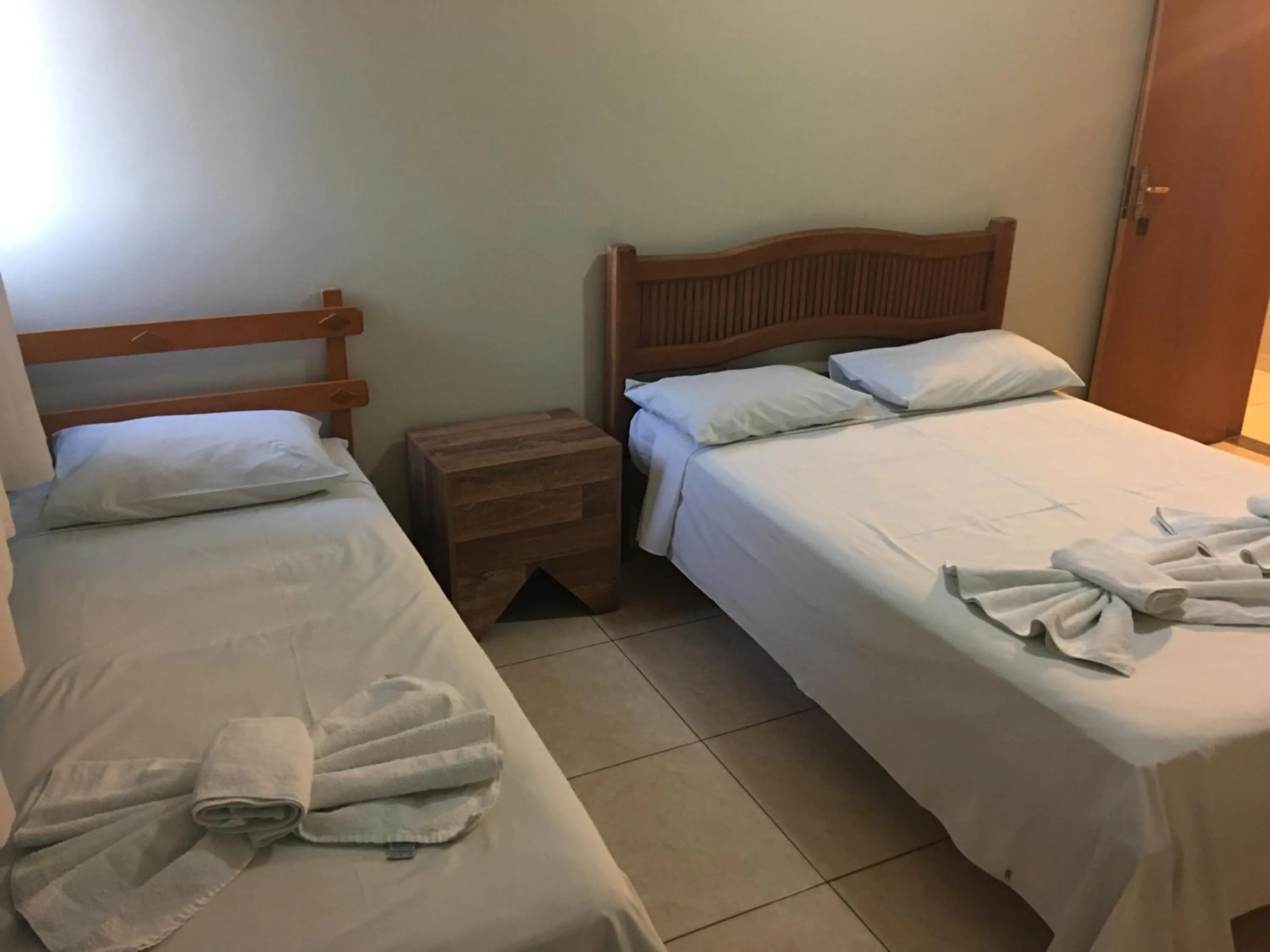 Bed in Trindade Hotel