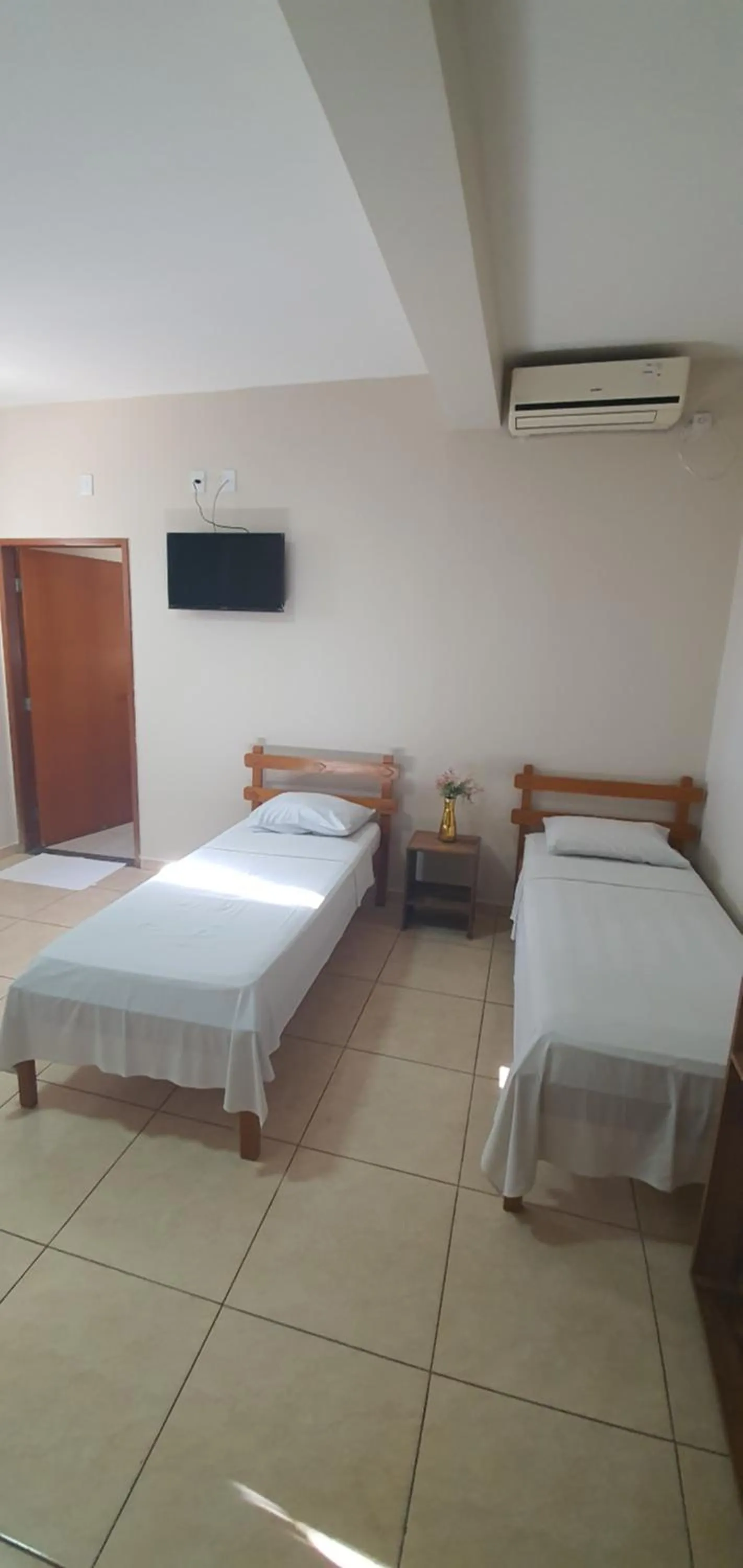 Bed in Trindade Hotel