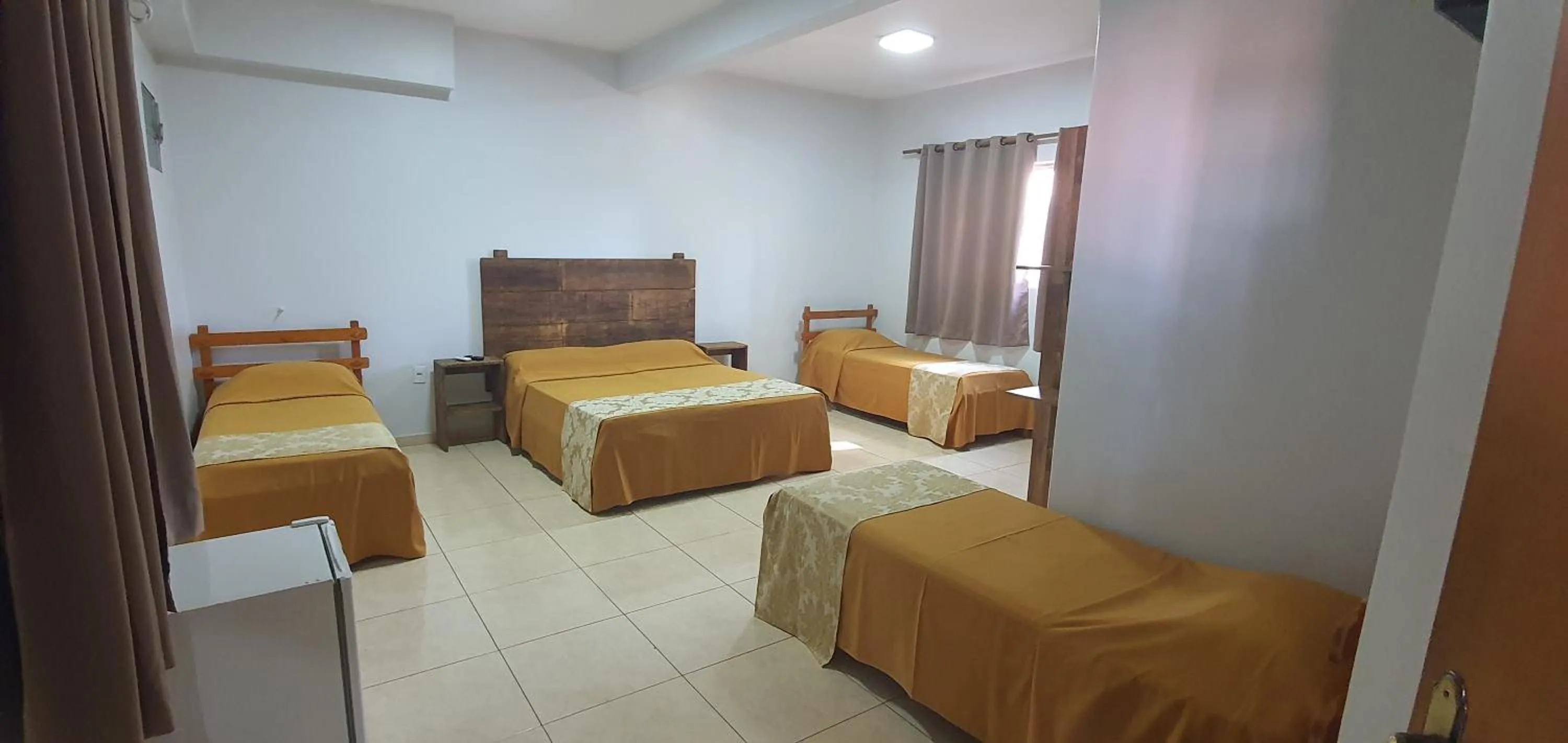 Bed in Trindade Hotel