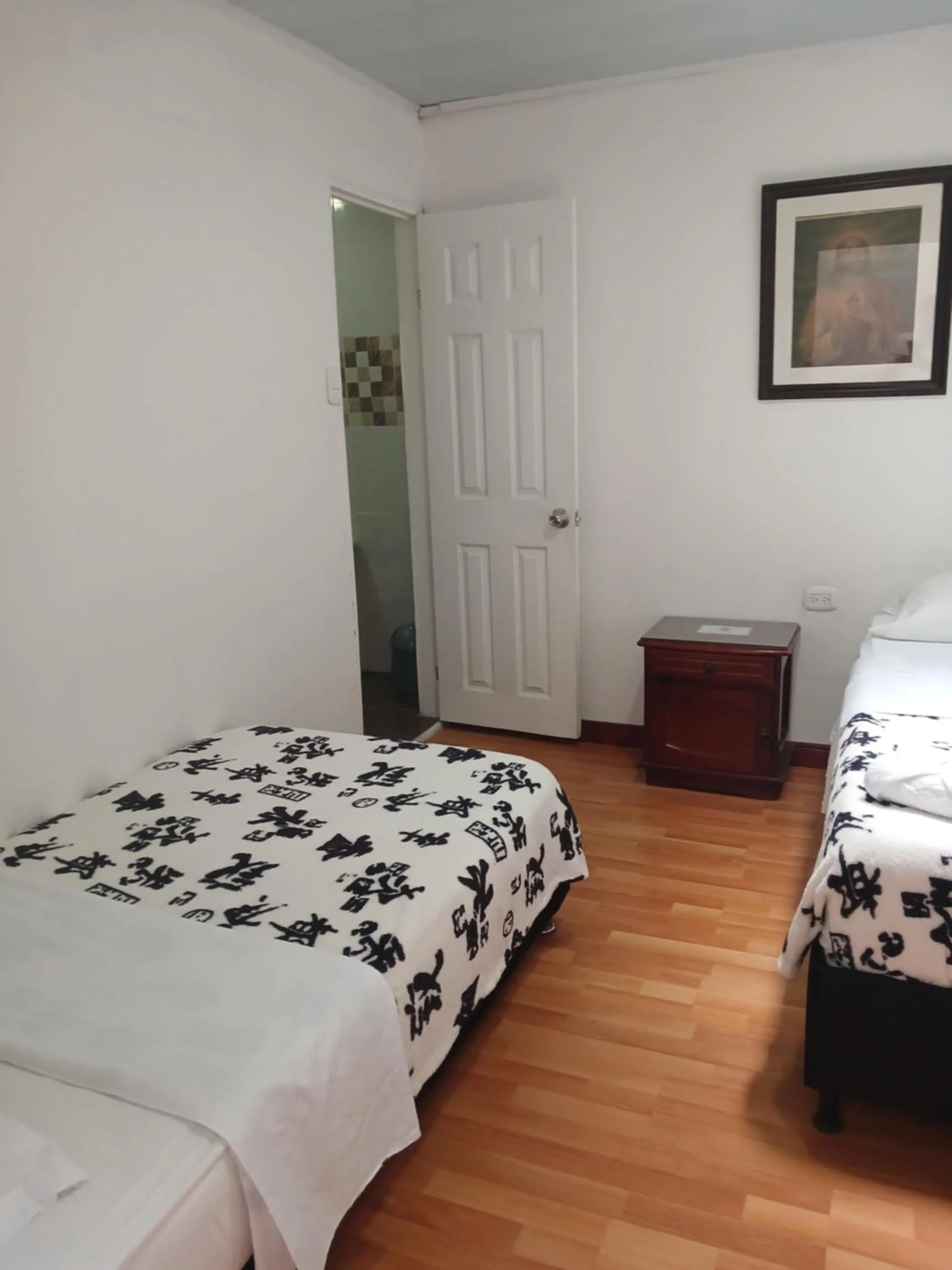 Bed in Bonsai Hotel Salamina Caldas