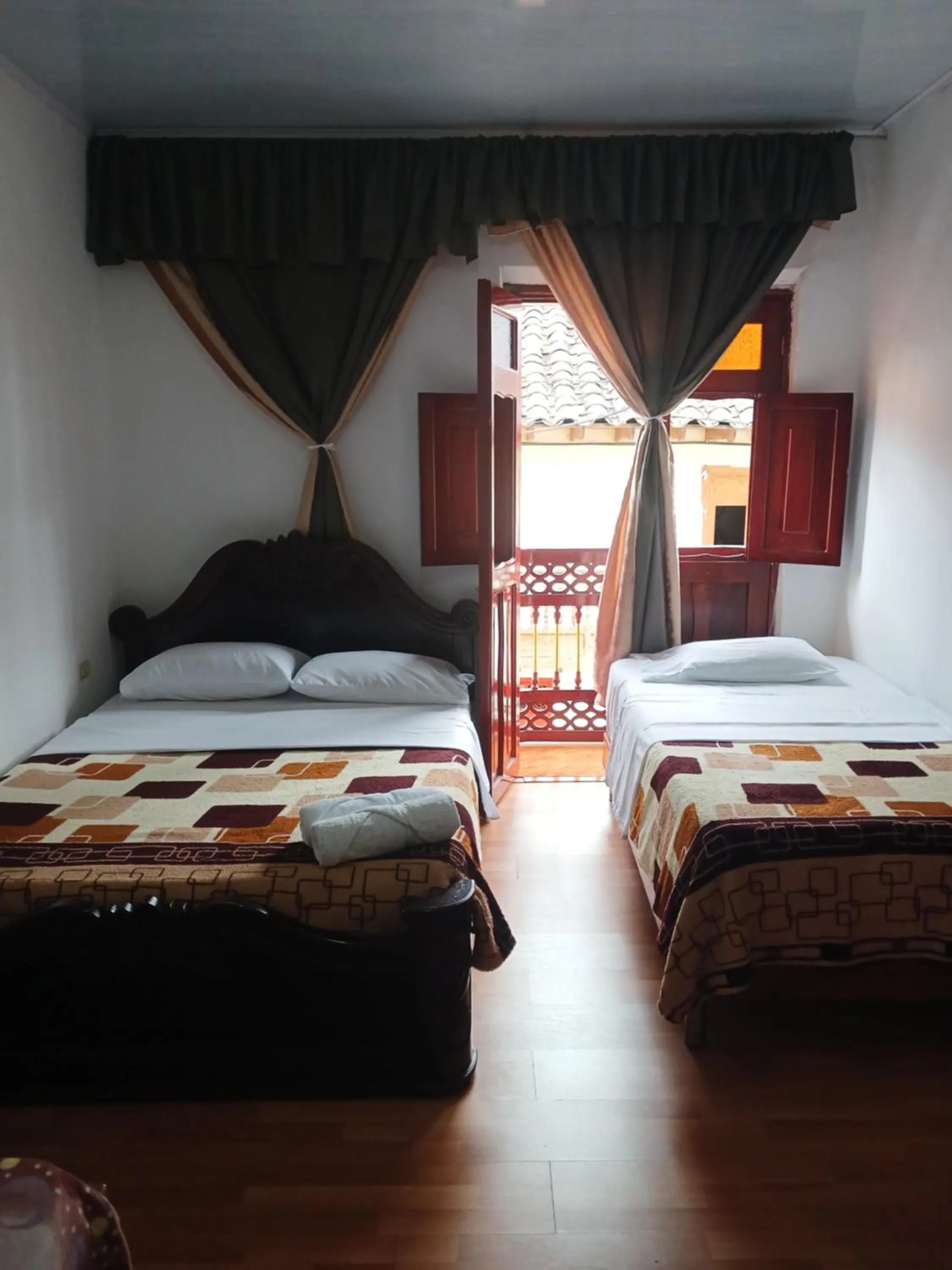 Bed in Bonsai Hotel Salamina Caldas