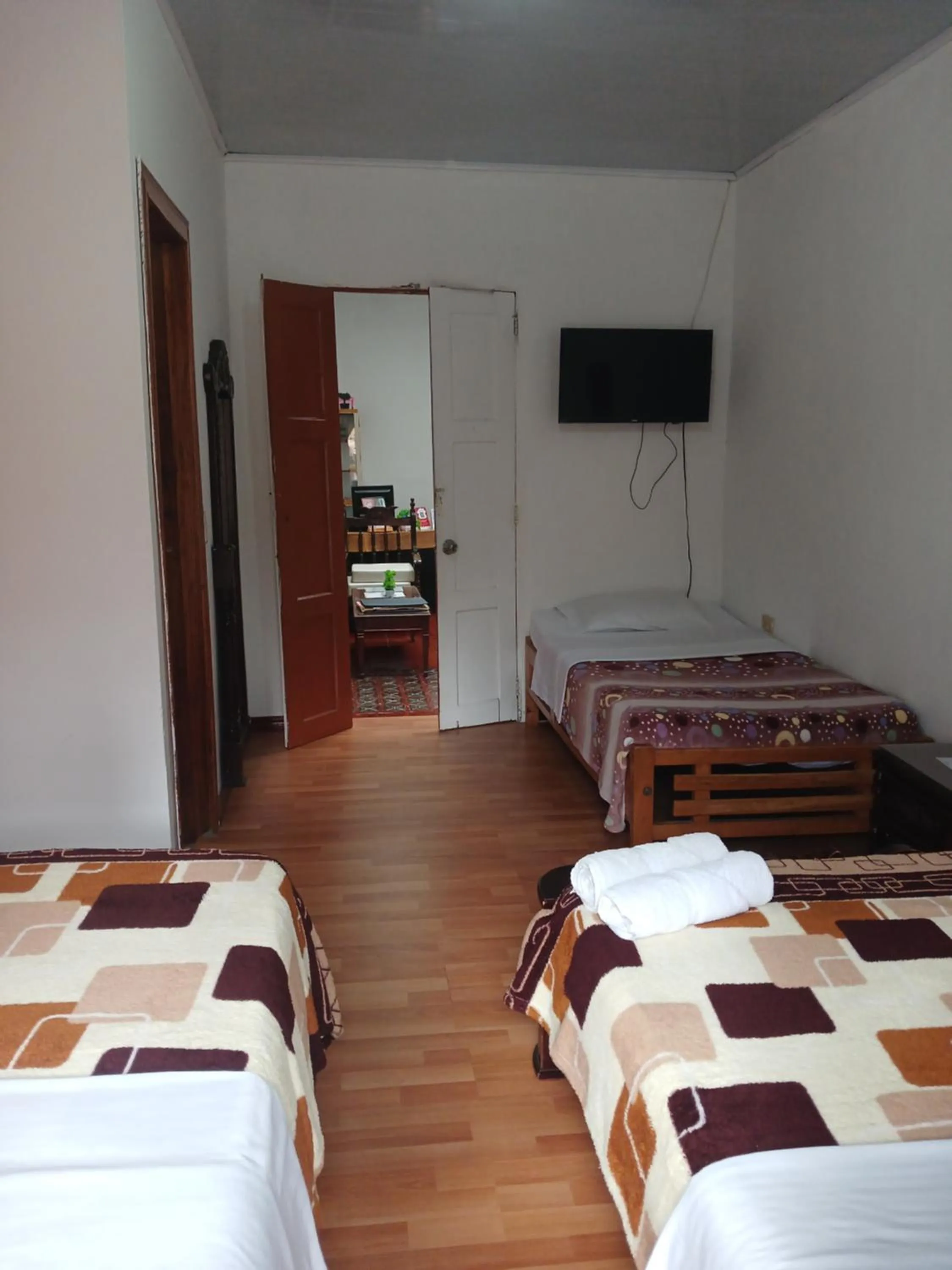 Bed in Bonsai Hotel Salamina Caldas