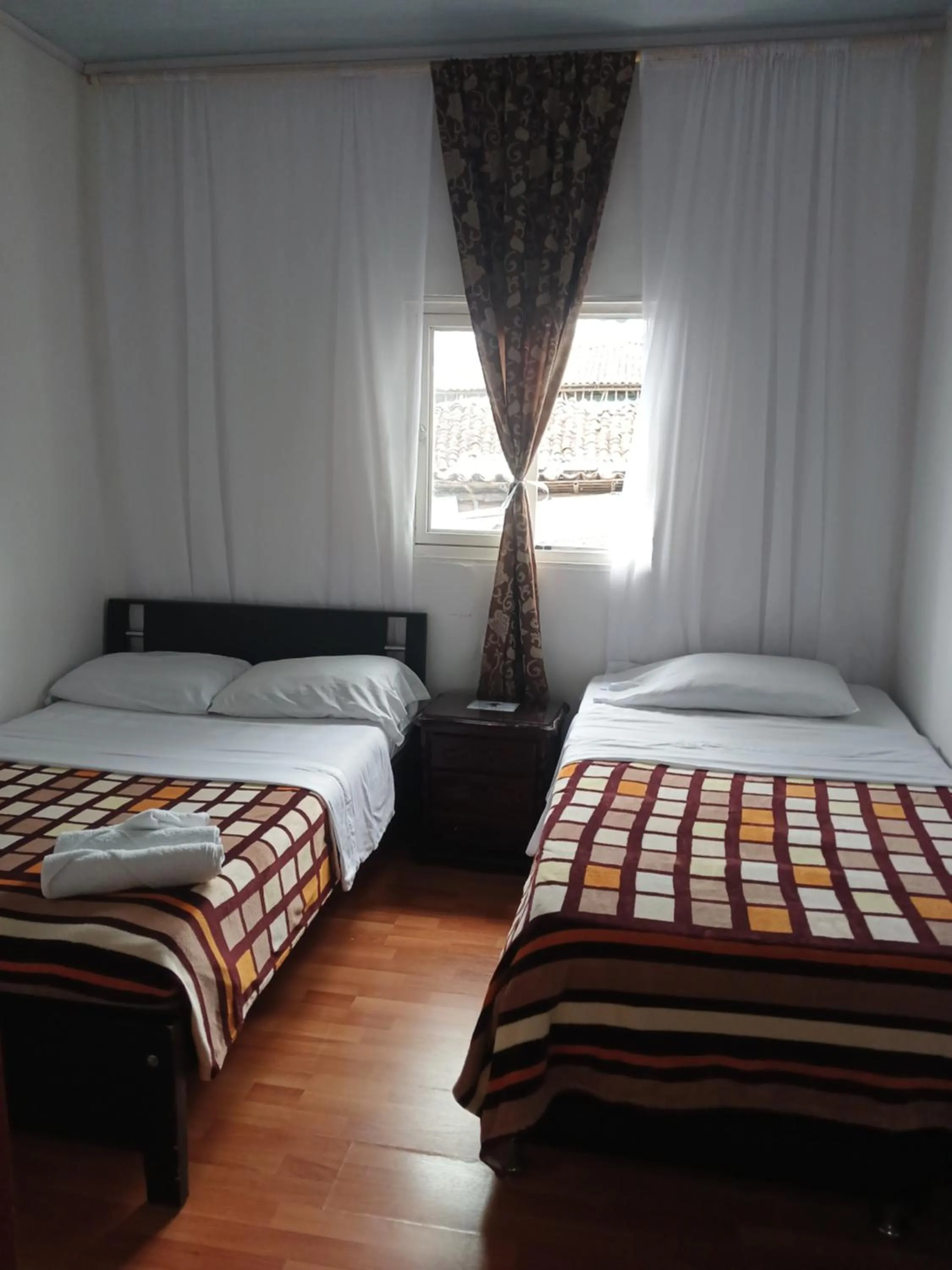 Bed in Bonsai Hotel Salamina Caldas