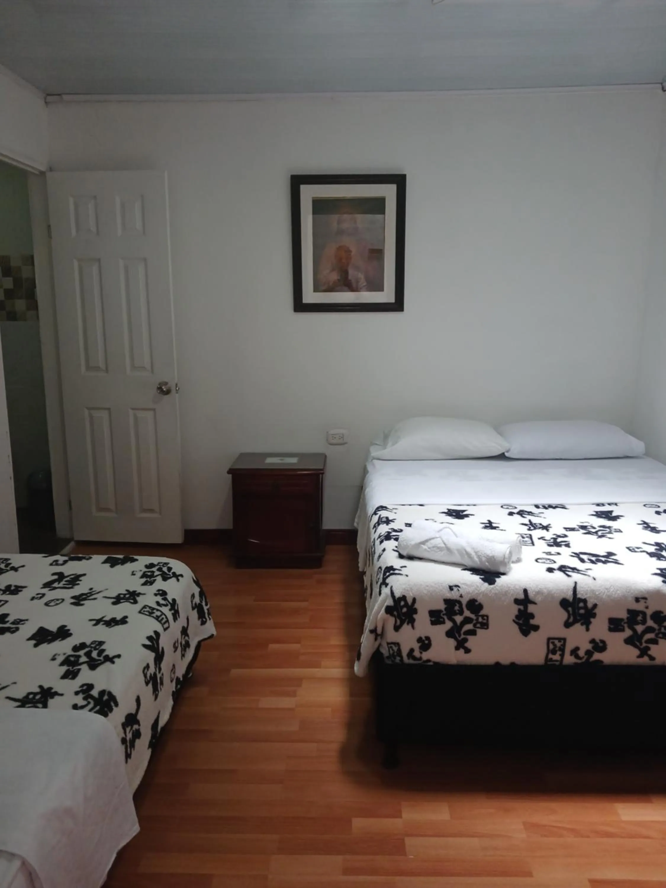 Bed in Bonsai Hotel Salamina Caldas