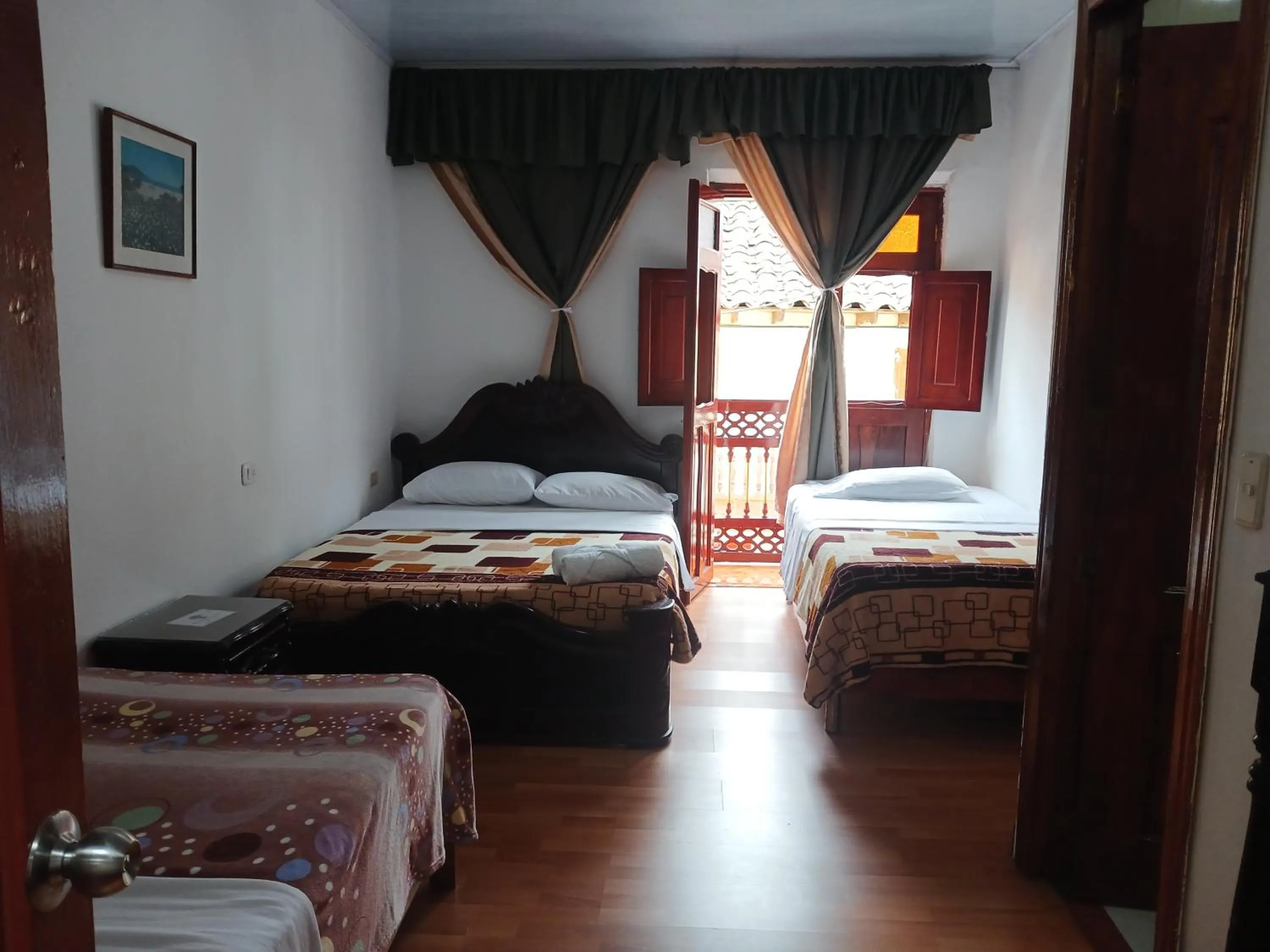Bed in Bonsai Hotel Salamina Caldas