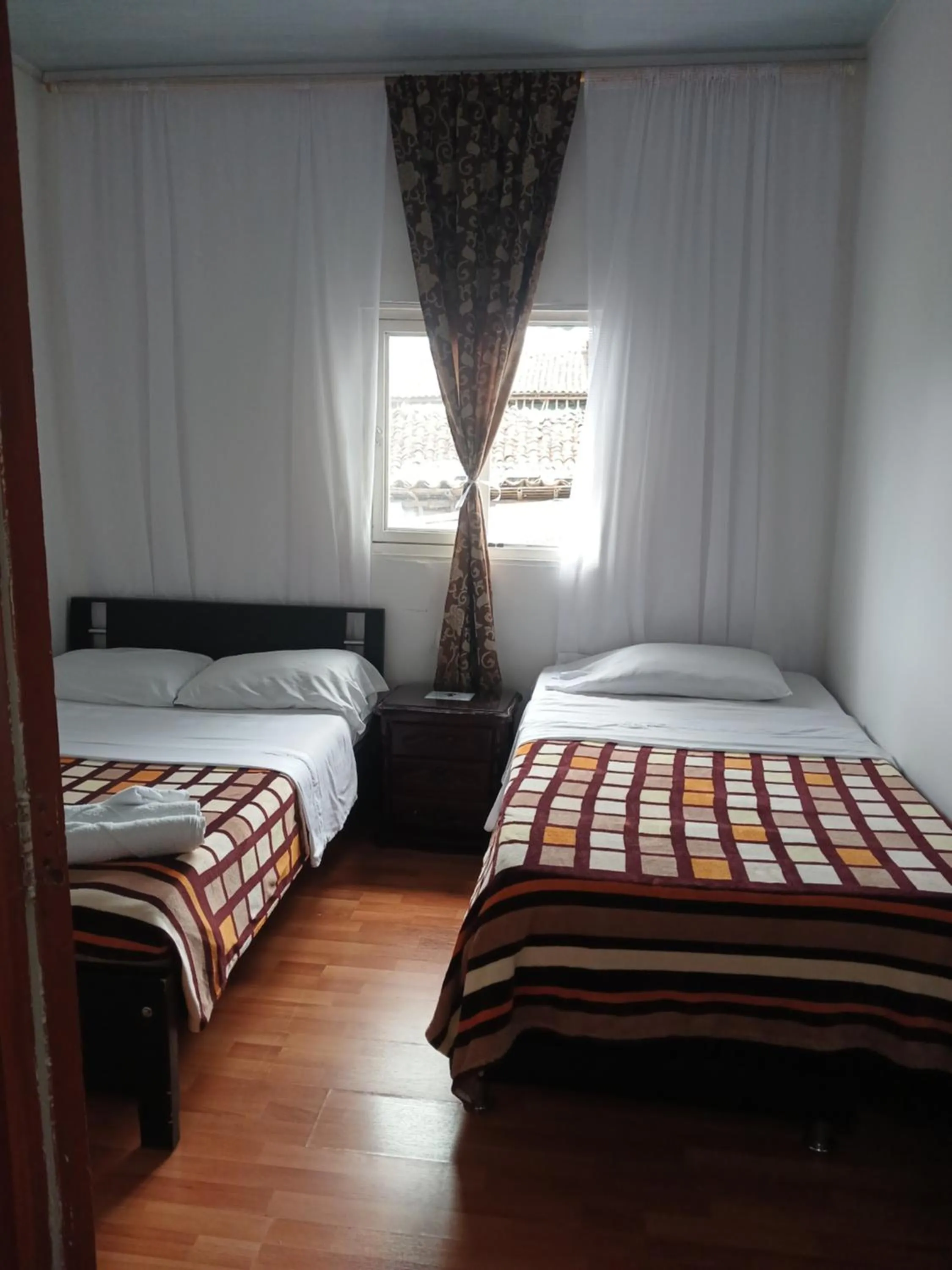 Bed in Bonsai Hotel Salamina Caldas
