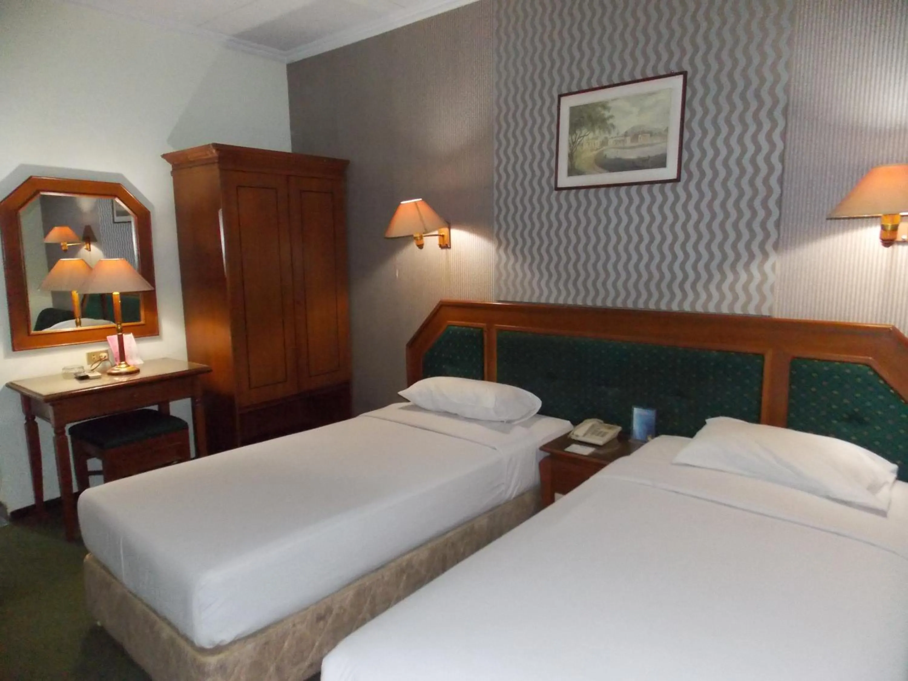 Bed in Puri Mega Hotel