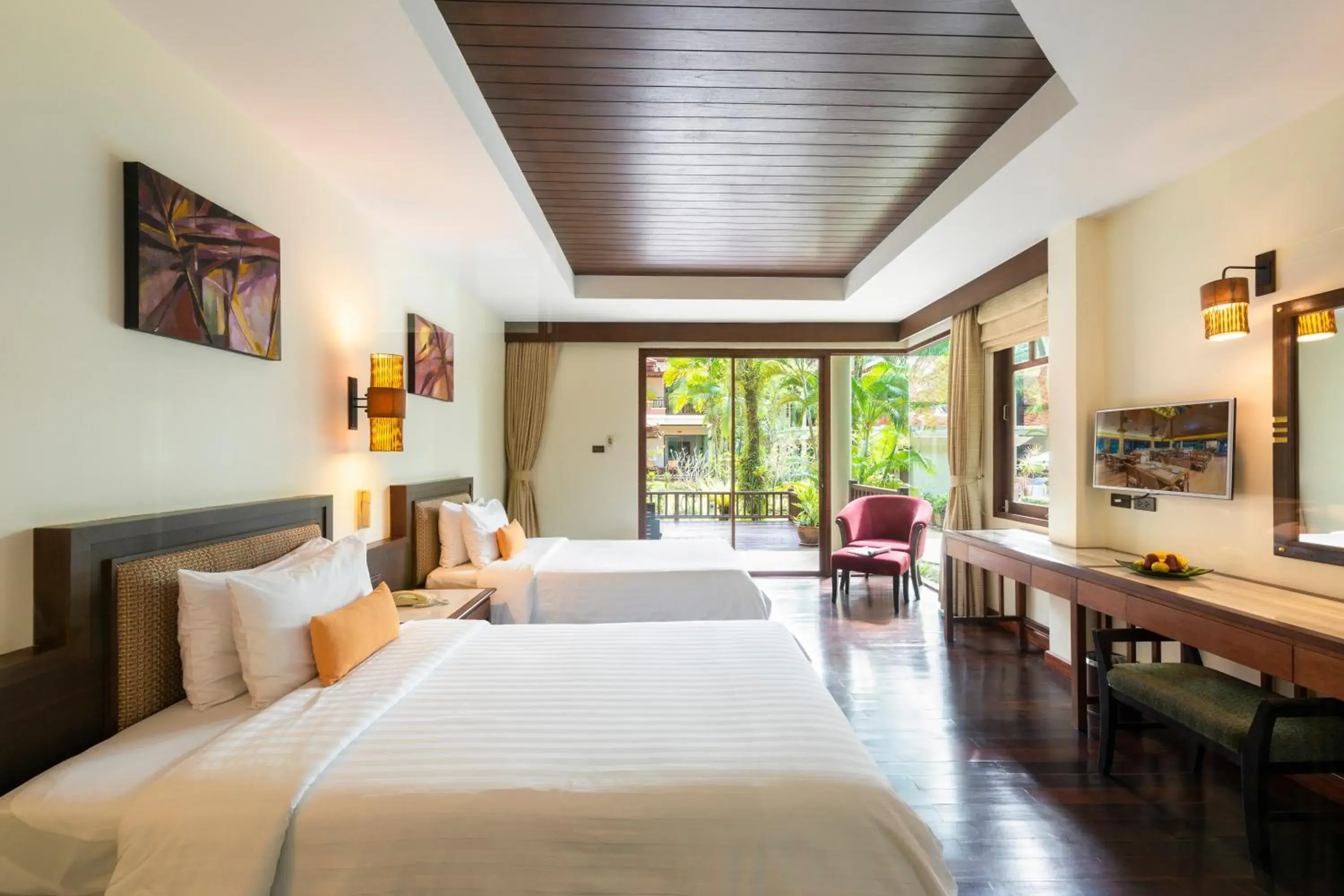 Garden view, Bed in Khaolak Bayfront Resort Garden view, Bed in Khaolak Bayfront Resort