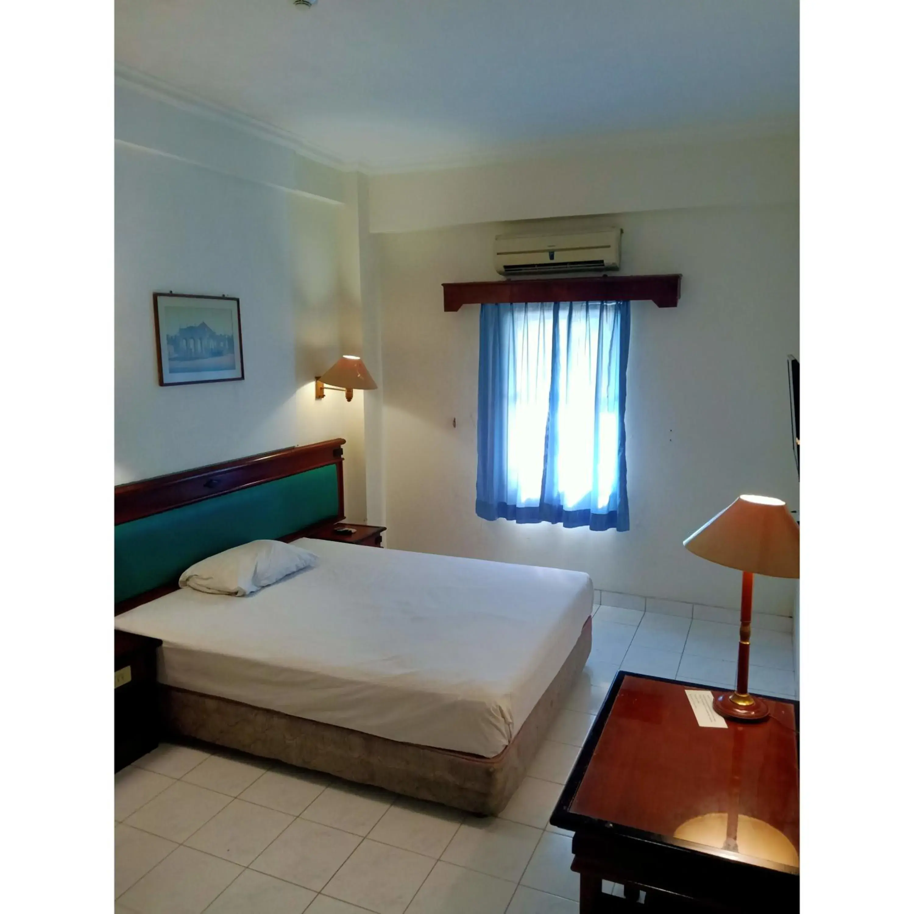 Bed in Puri Jaya Hotel Bed in Puri Jaya Hotel