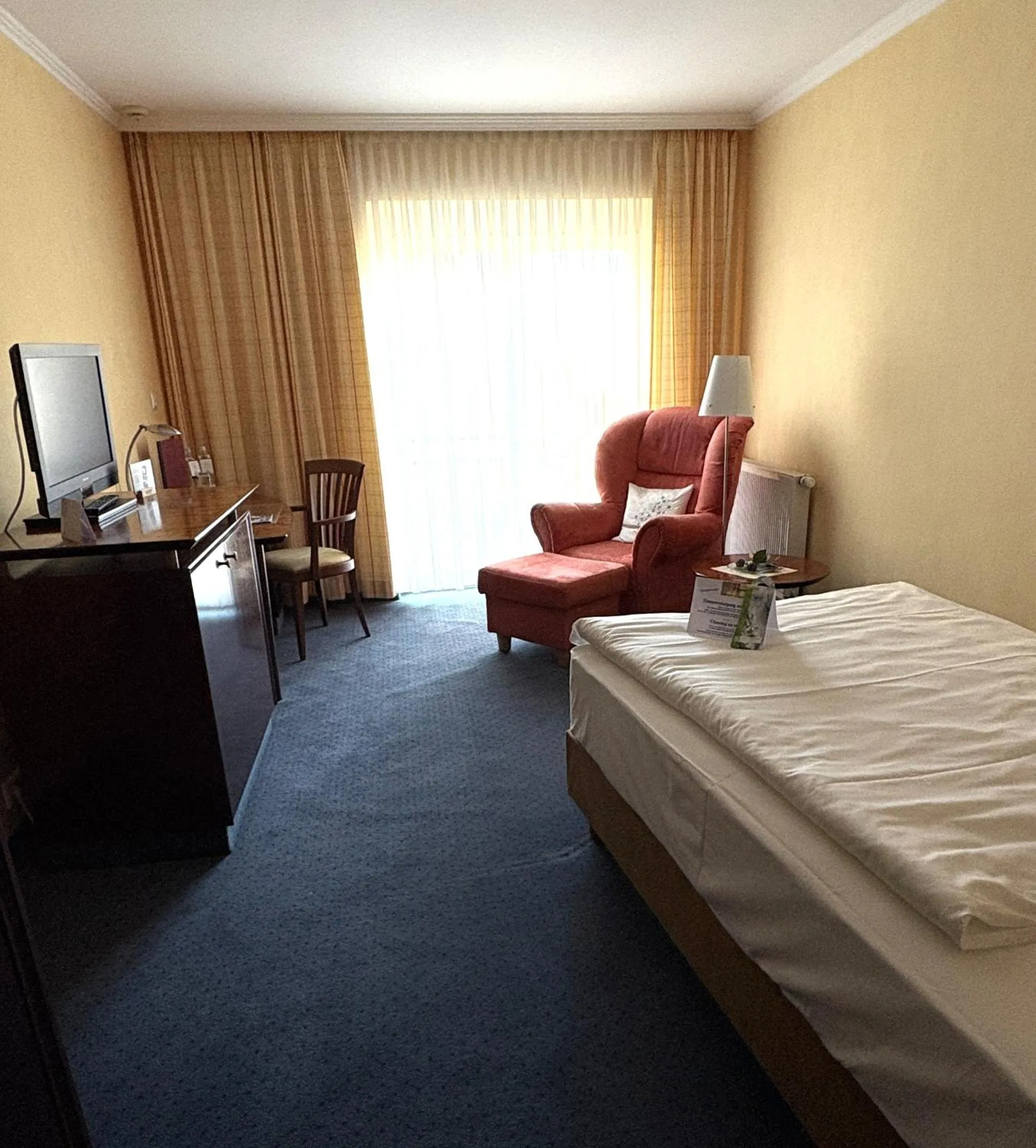 Photo of the whole room, Bed in Akzent Hotel Höltje