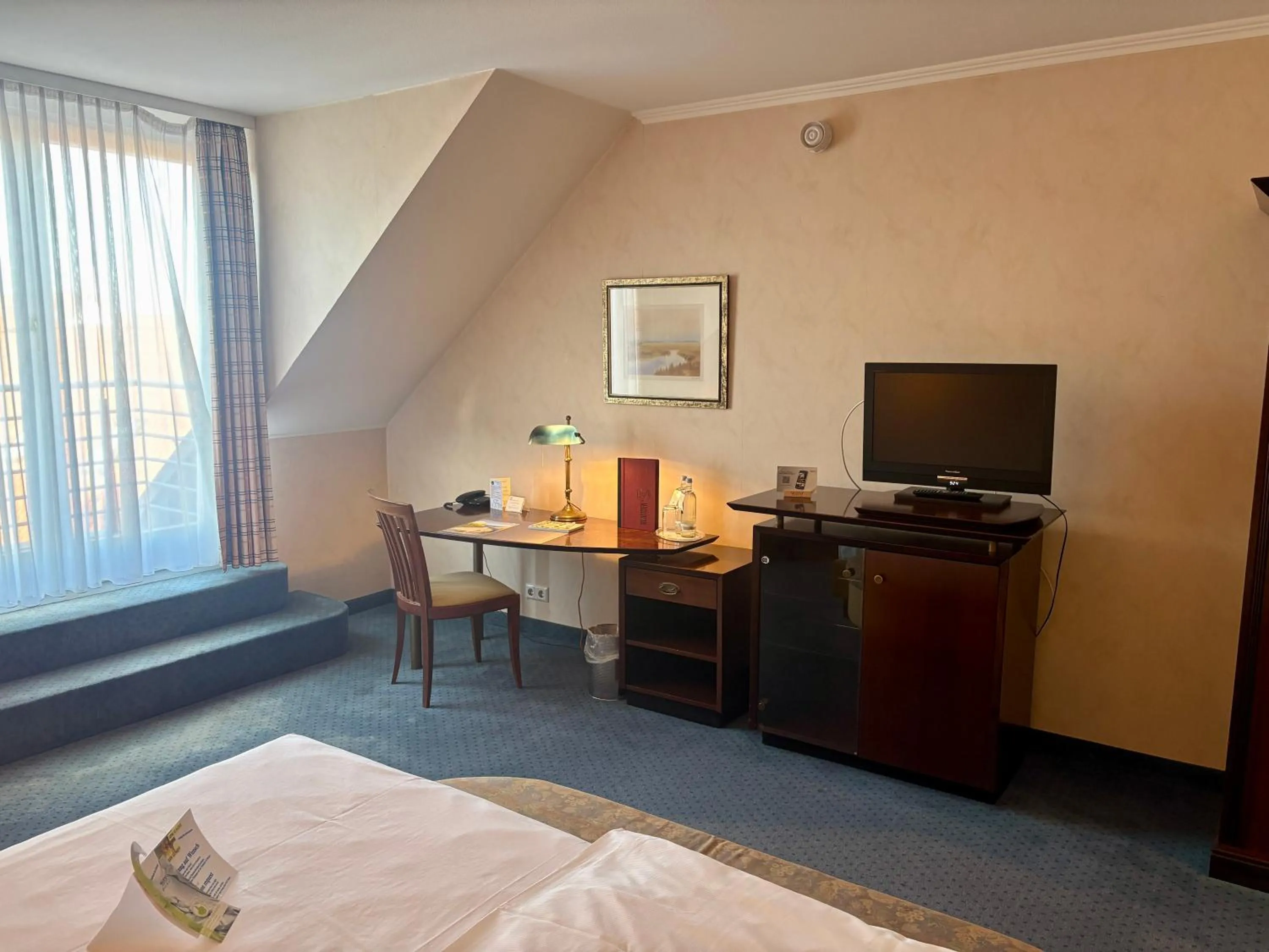 Photo of the whole room, Bed in Akzent Hotel Höltje