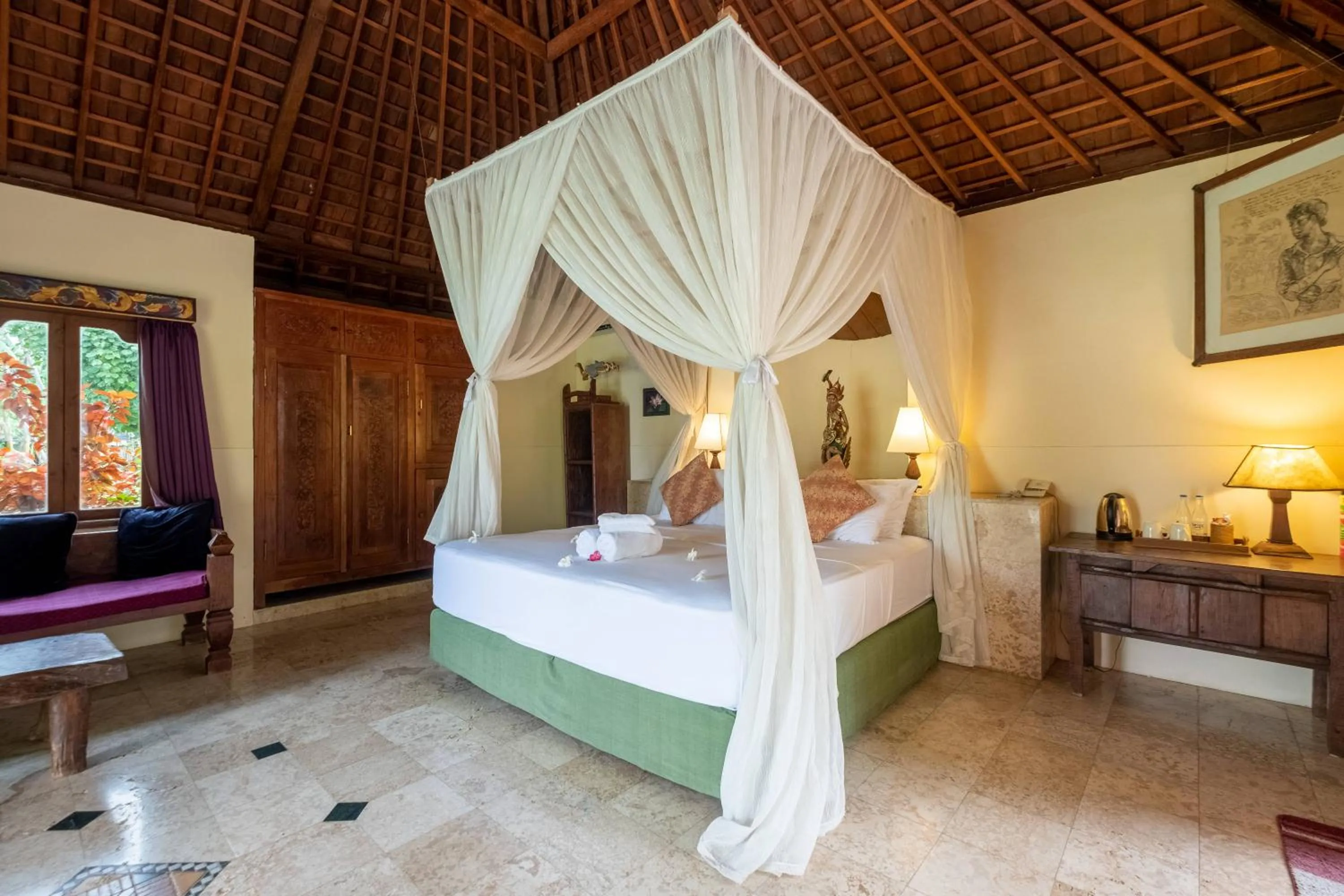 Bed in Taman Sari Bali Resort and Spa