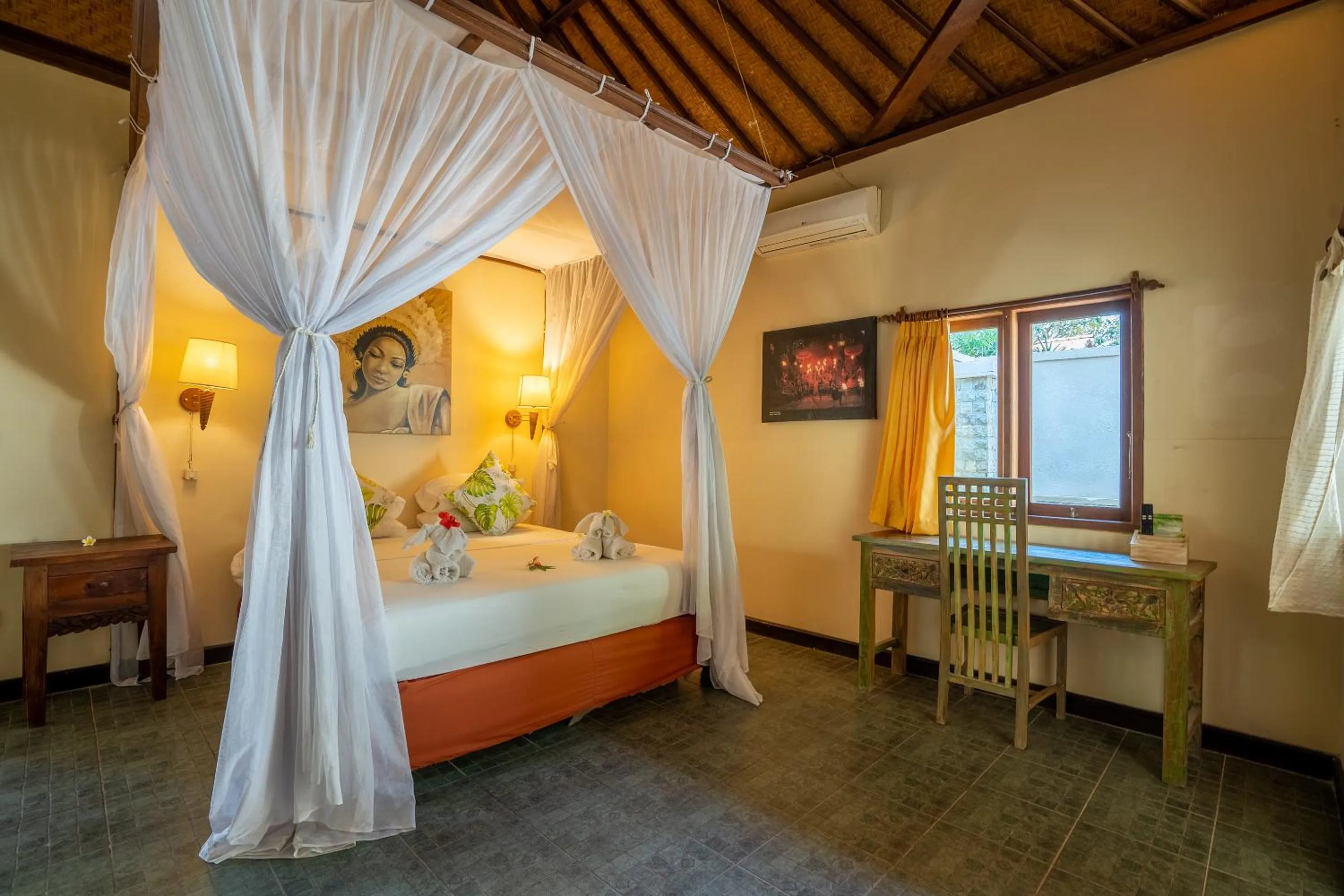 Bed in Taman Sari Bali Resort and Spa