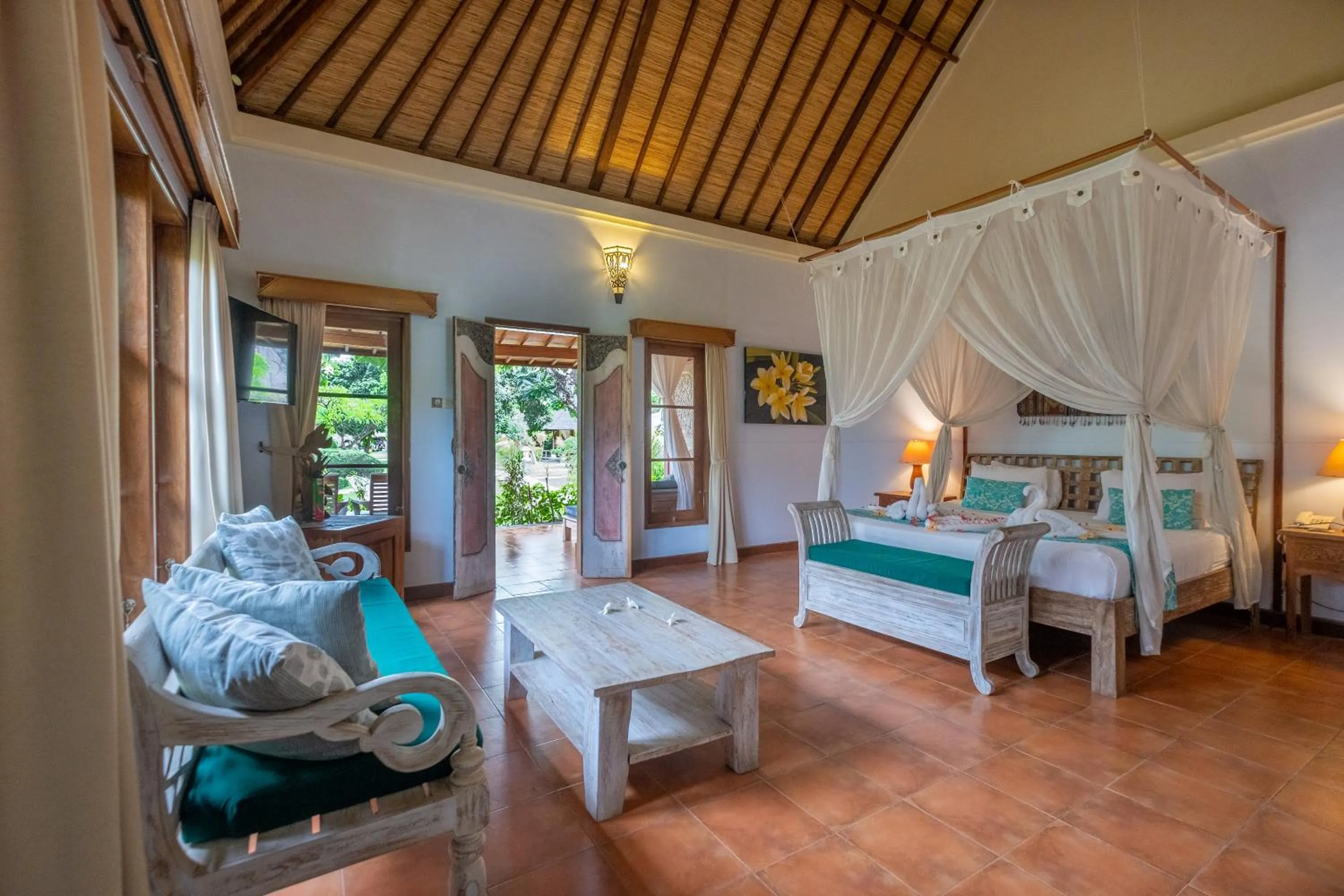 Bed in Taman Sari Bali Resort and Spa