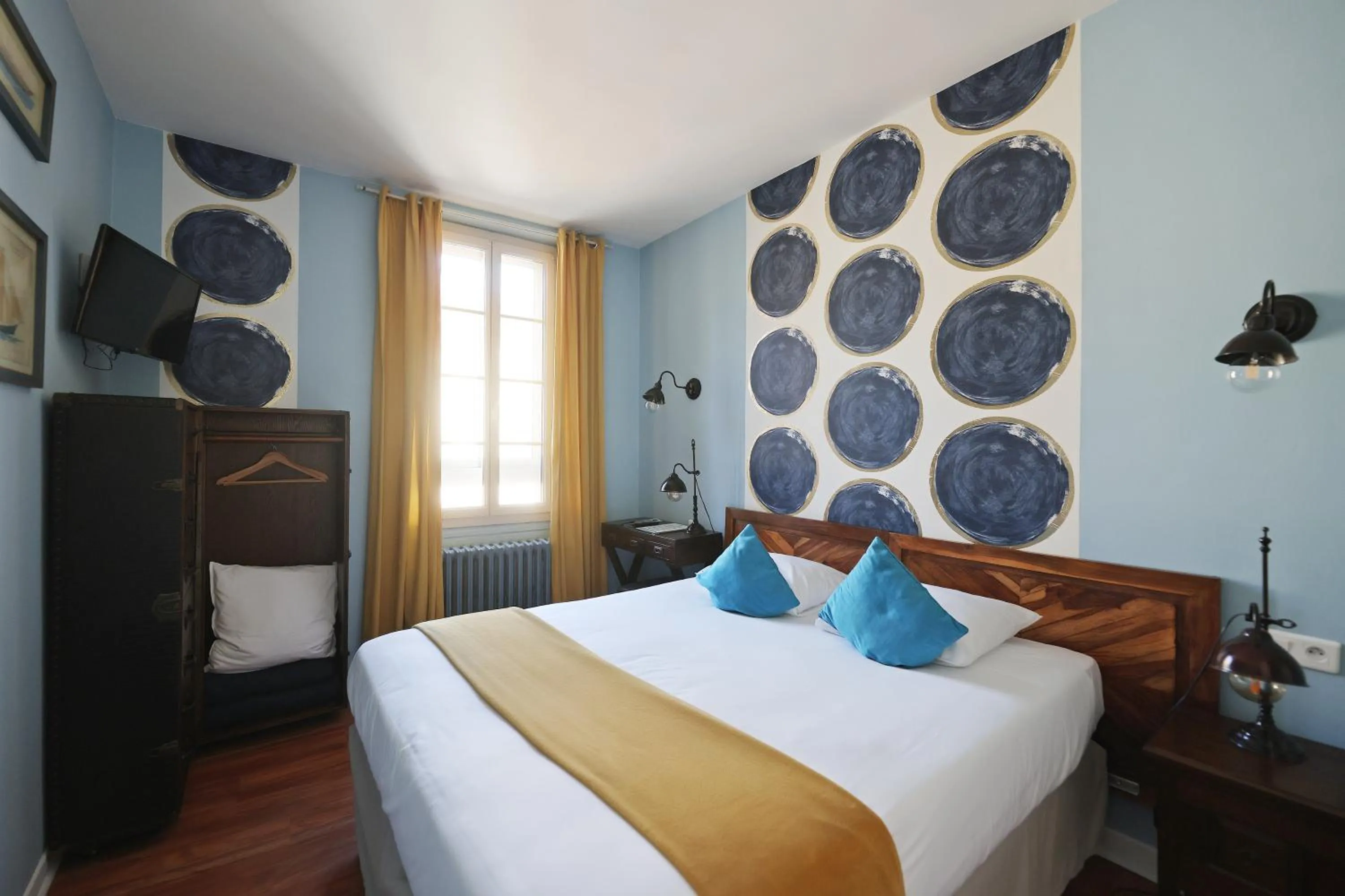 Bed in Hotel Les Pasteliers