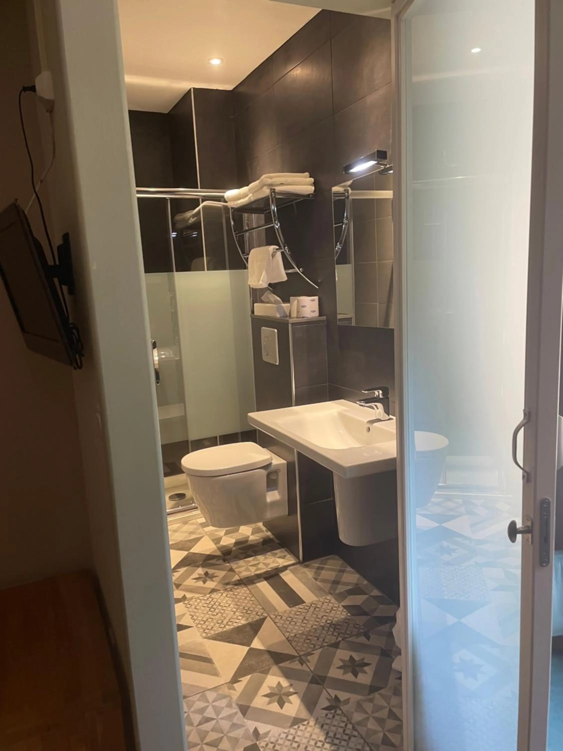 Bathroom in Logis Hotel Le Lonca