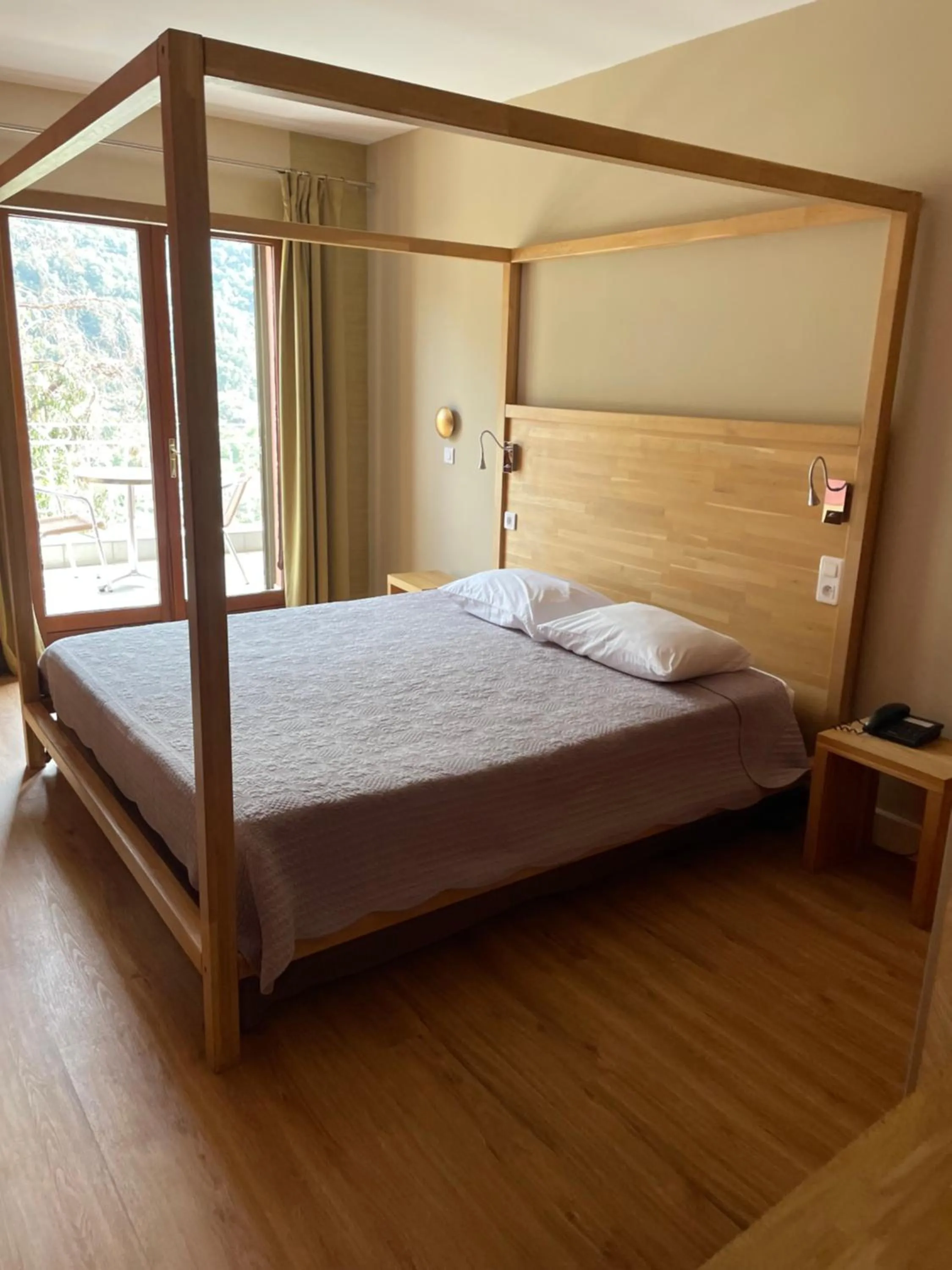 Photo of the whole room, Bed in Logis Hotel Le Lonca