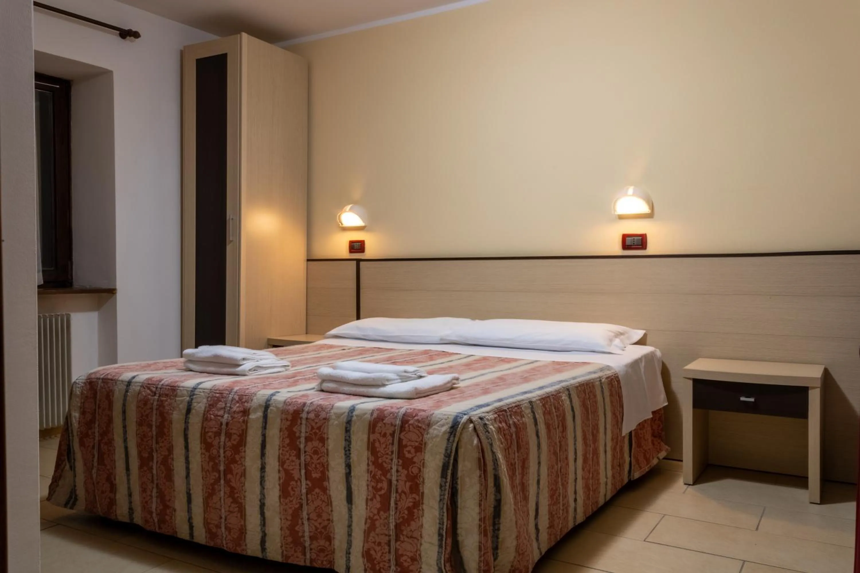 Bedroom, Bed in Hotel Zodiaco & Spa