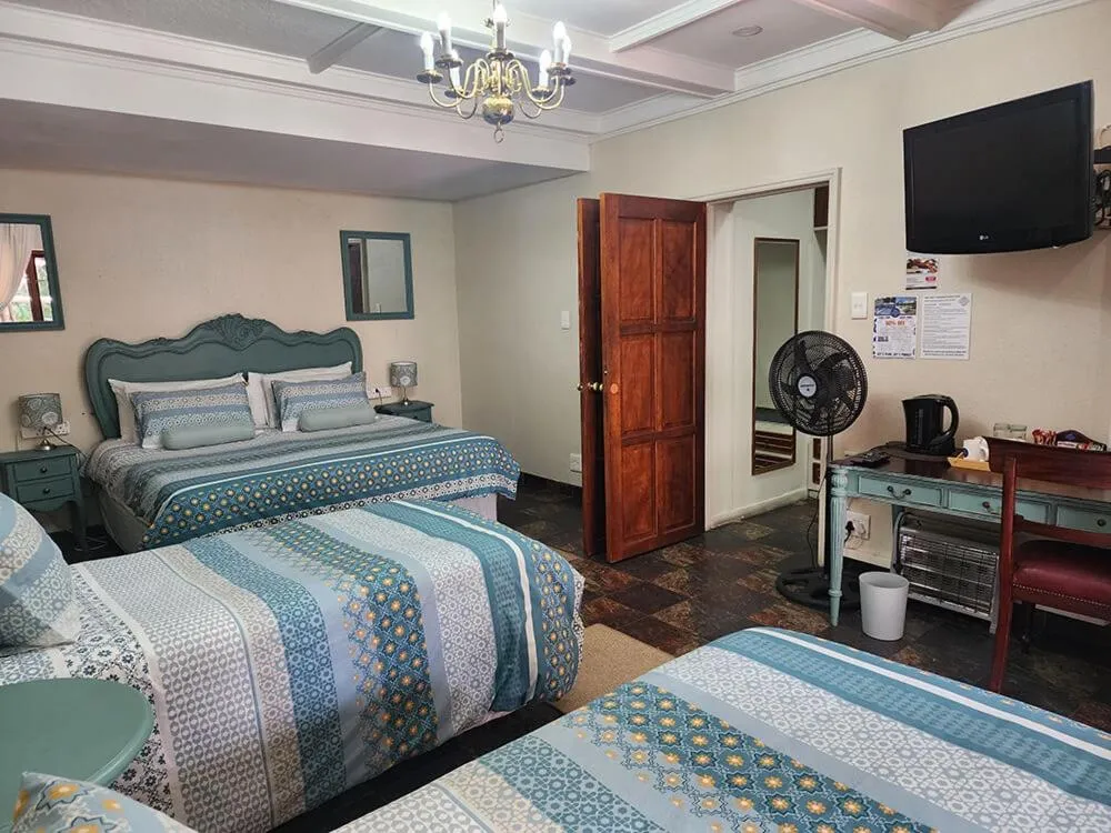 Bed in Goodnight Guest Lodge