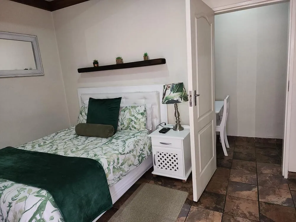 Bed in Goodnight Guest Lodge