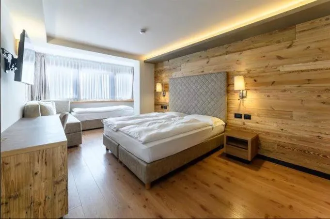 Bed in Hotel Crozzon