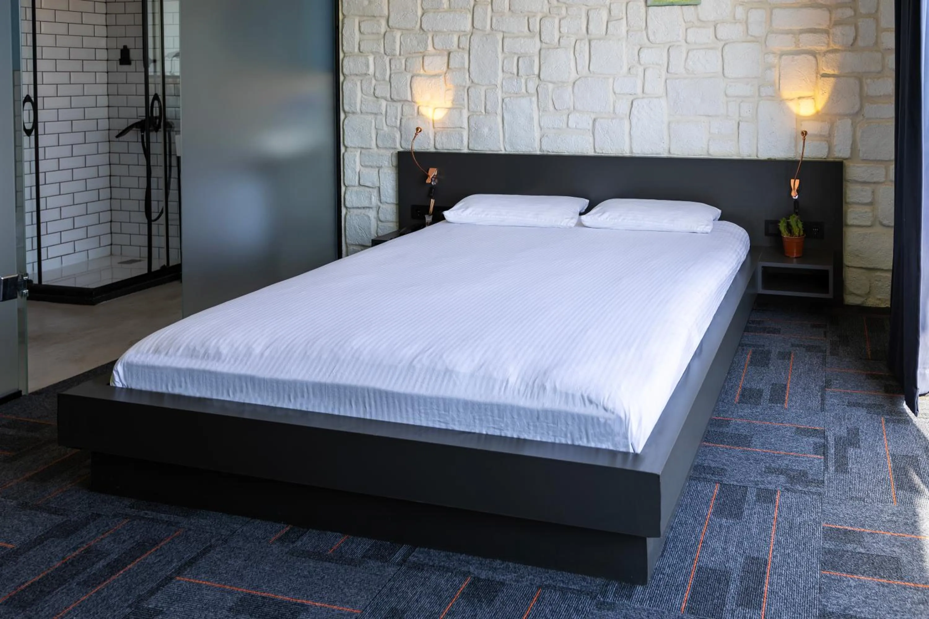 Bed in Mene City Hotel