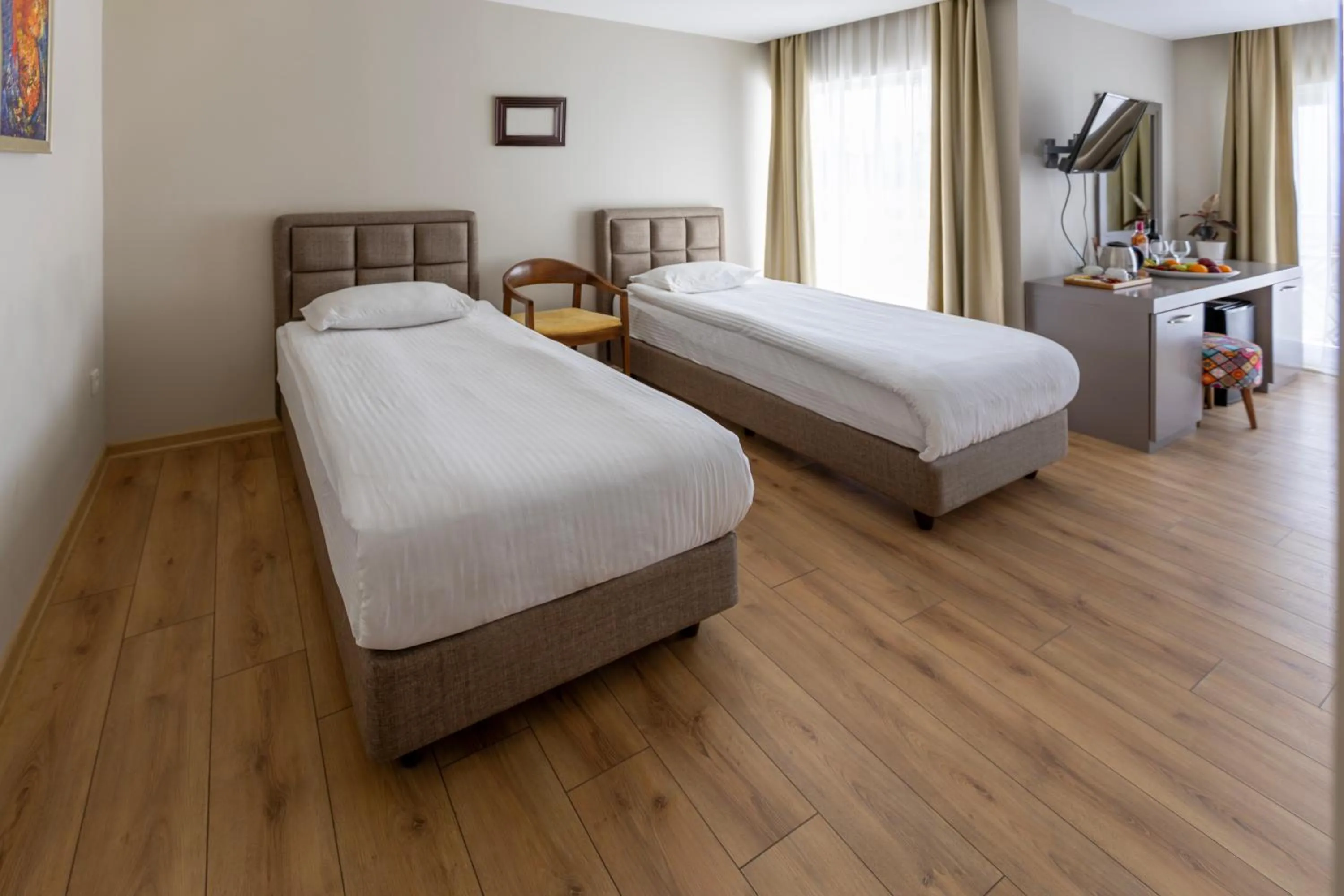 Bed in Mene City Hotel