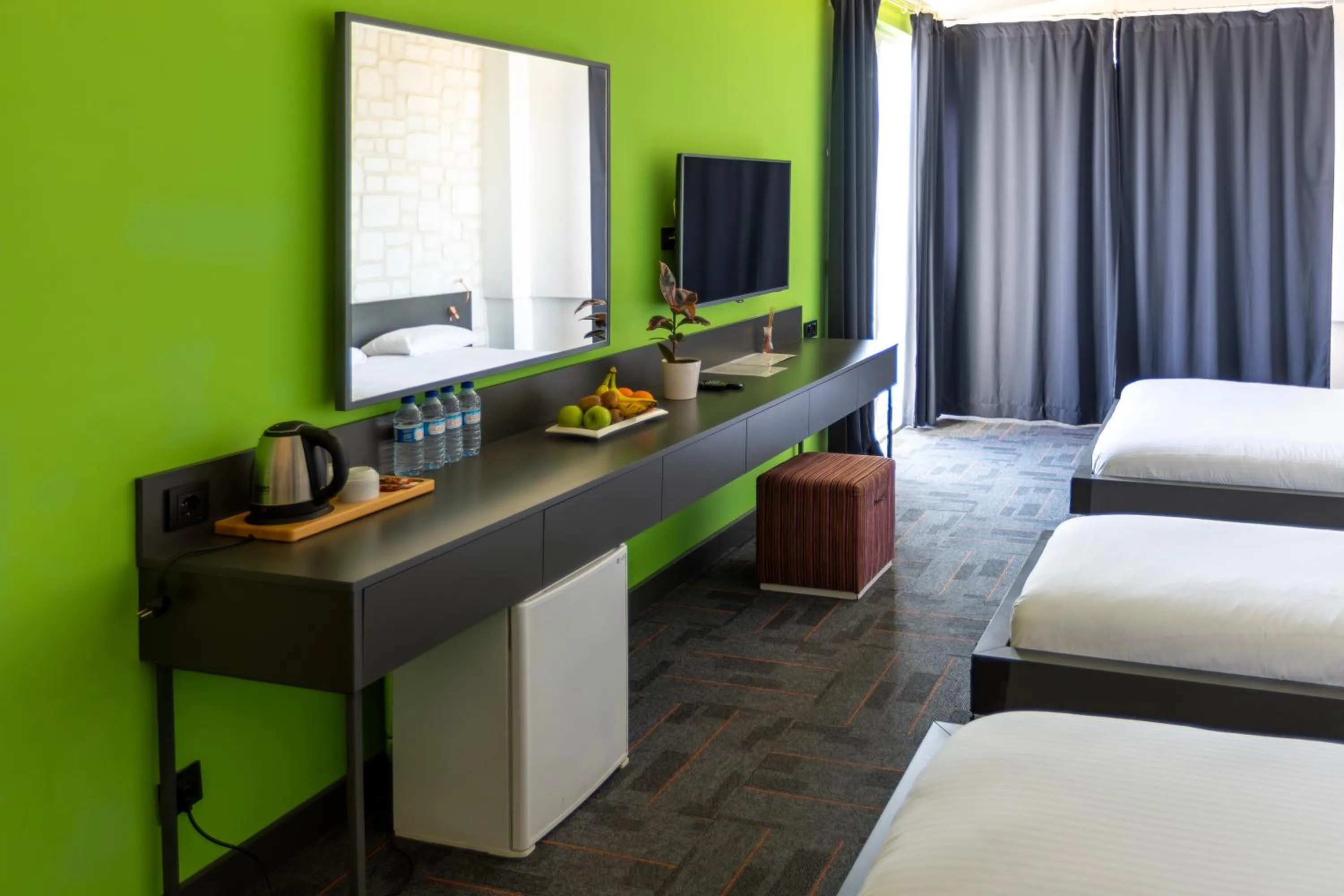 Bed in Mene City Hotel