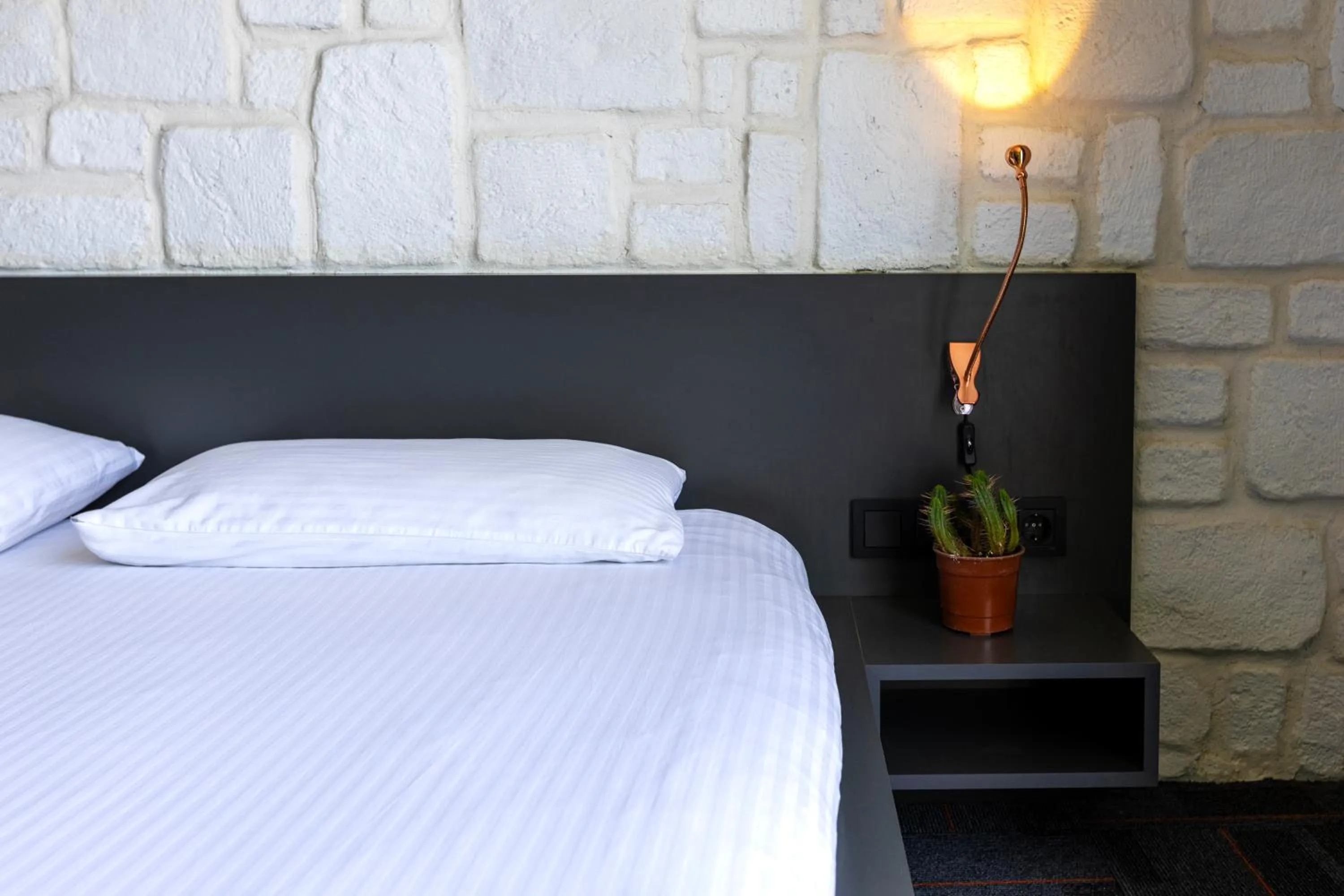 Bed in Mene City Hotel