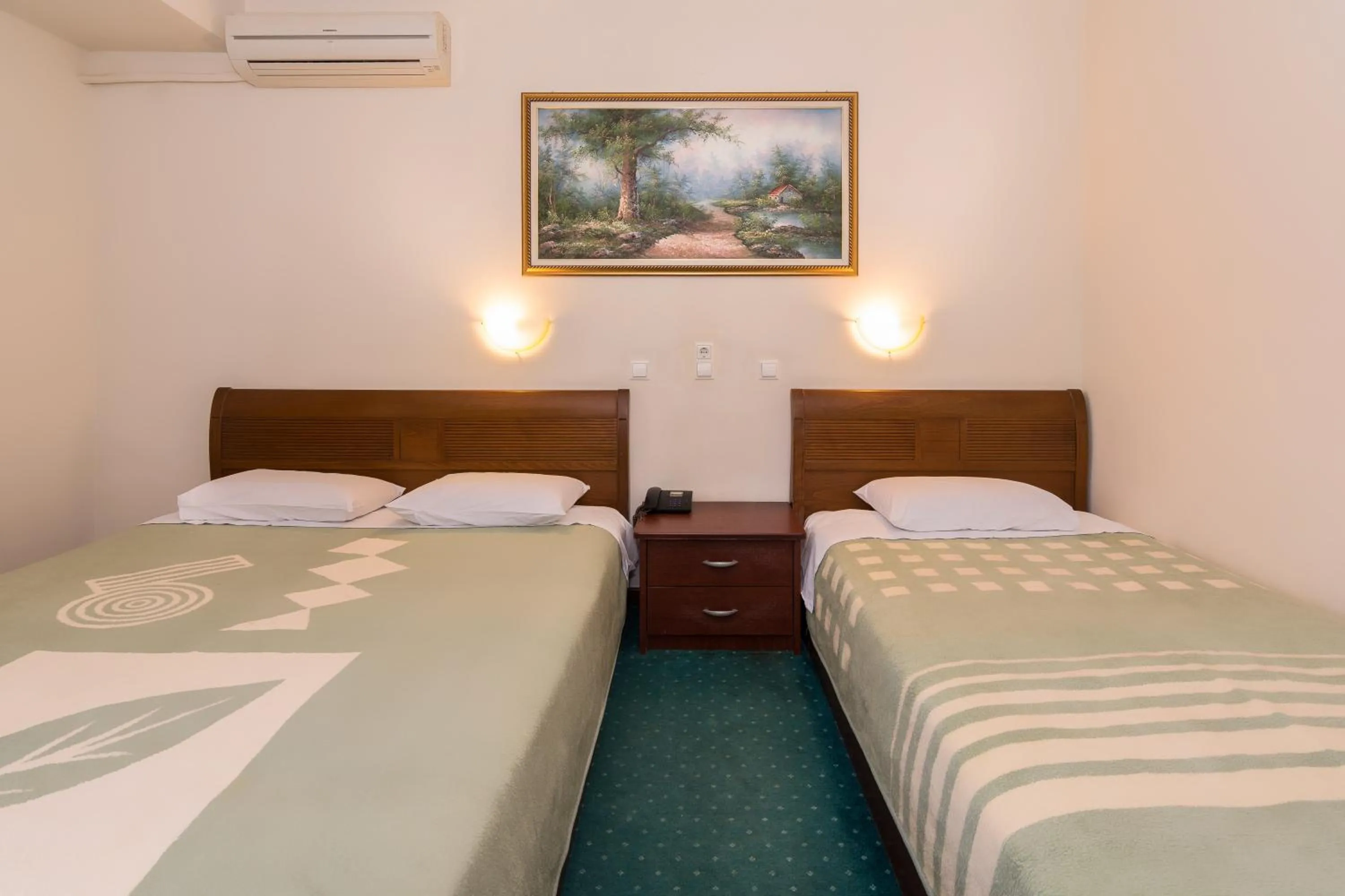 Bed in Hotel Alexandros