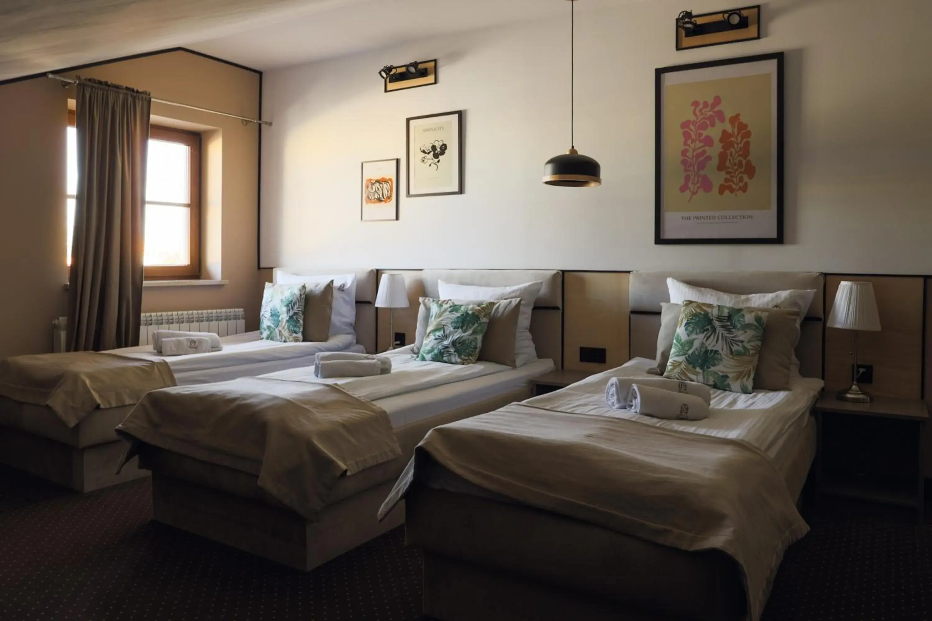 Standard Triple Room in Dworek Standard Triple Room in Dworek