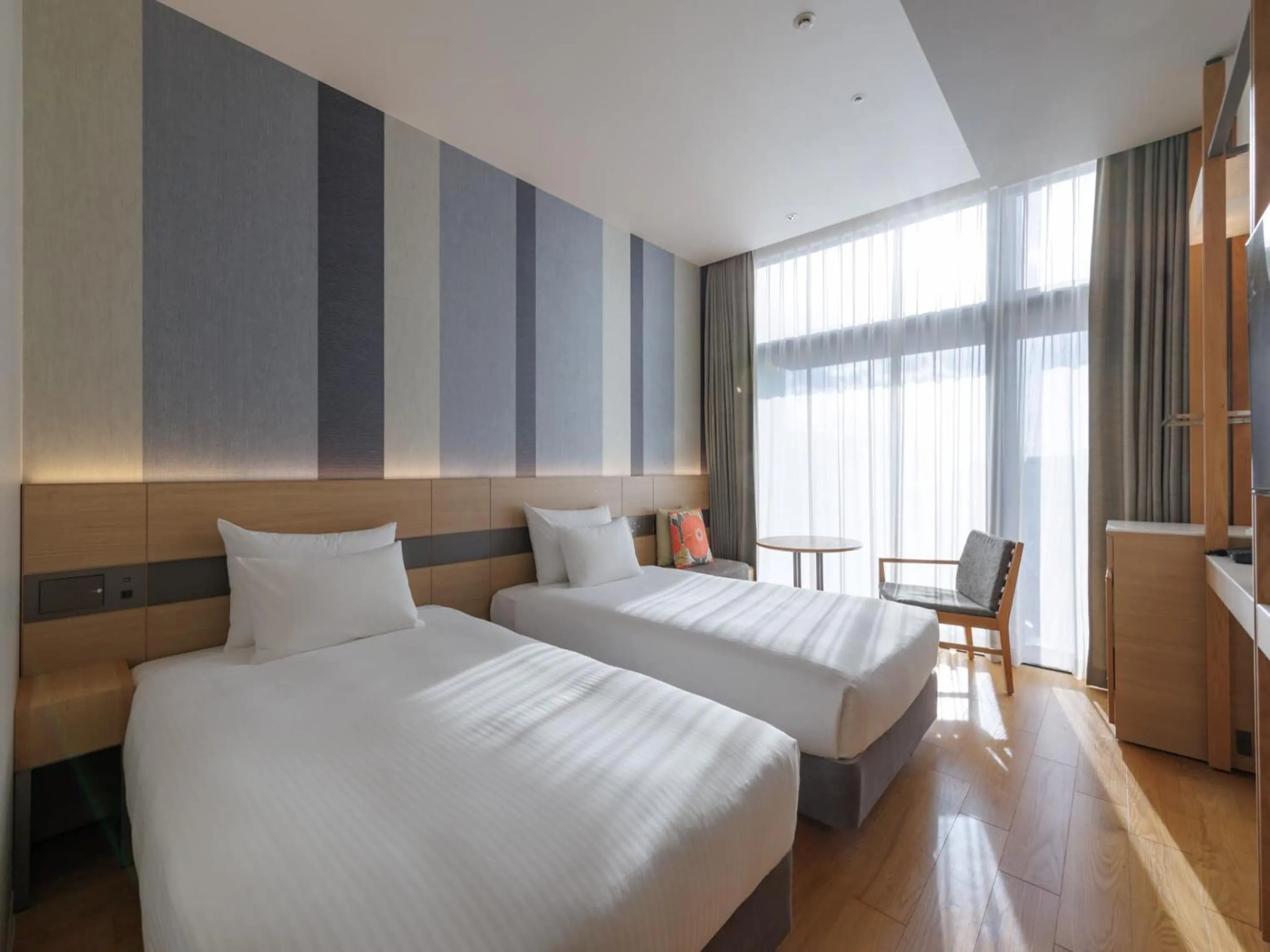 Photo of the whole room, Bed in JR Kyushu Hotel Blossom Naha