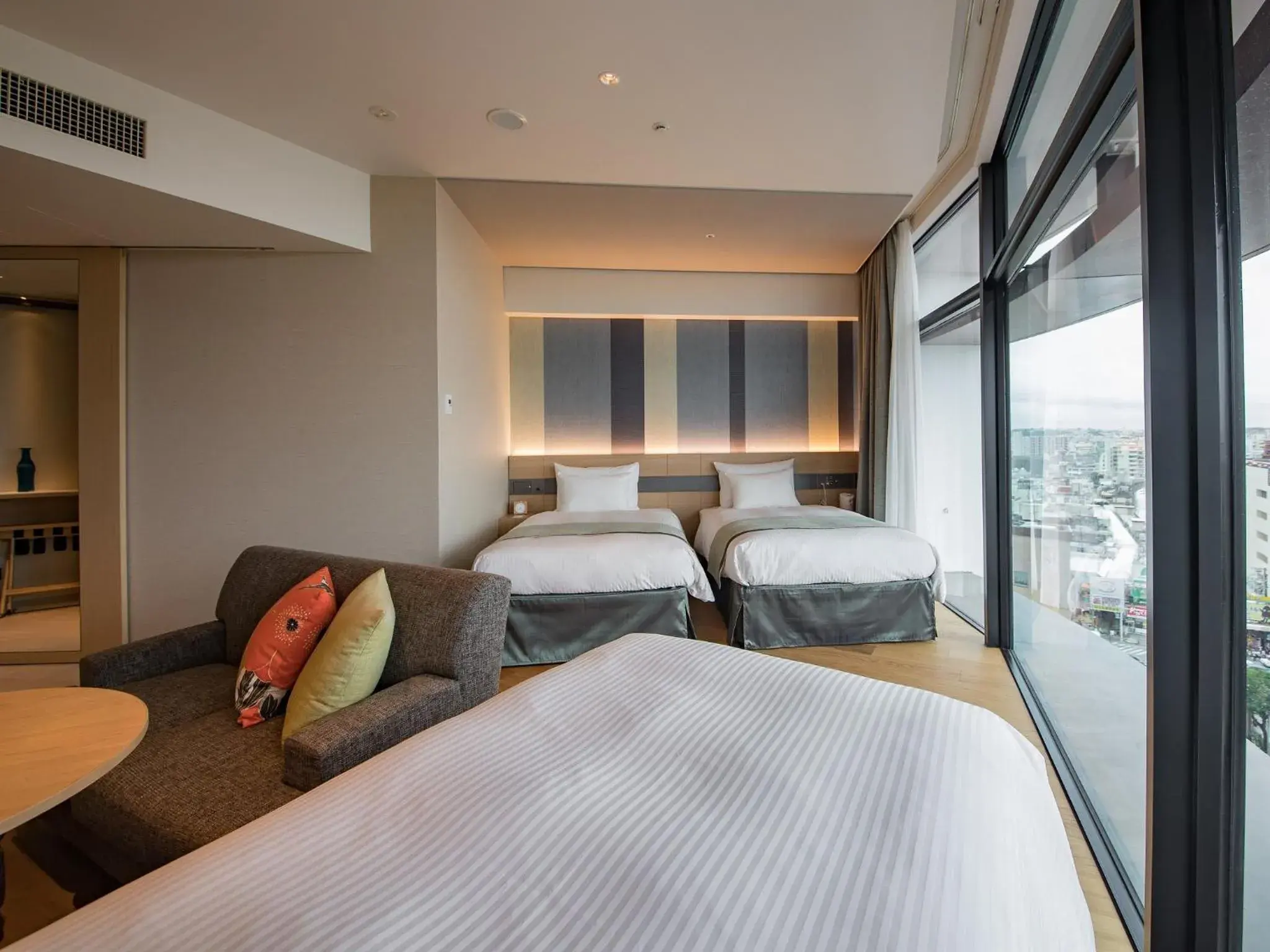 Photo of the whole room, Bed in JR Kyushu Hotel Blossom Naha Photo of the whole room, Bed in JR Kyushu Hotel Blossom Naha