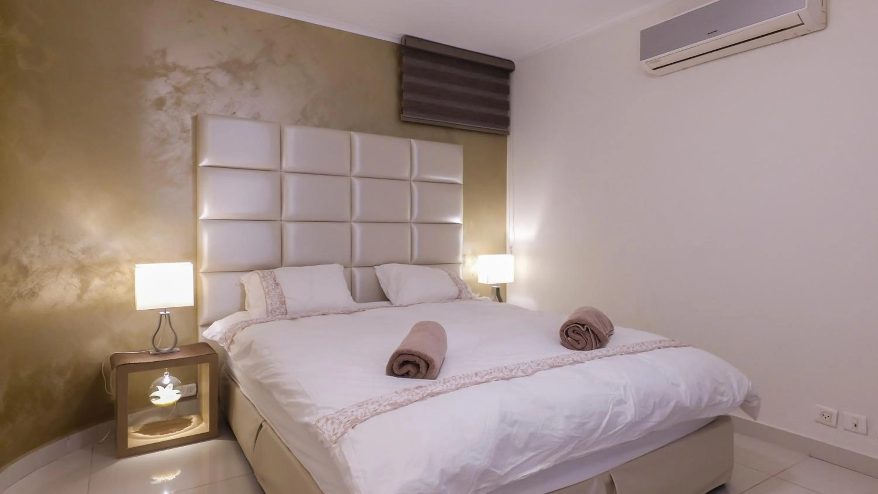 Property building, Bed in Luxury Suite by the pool