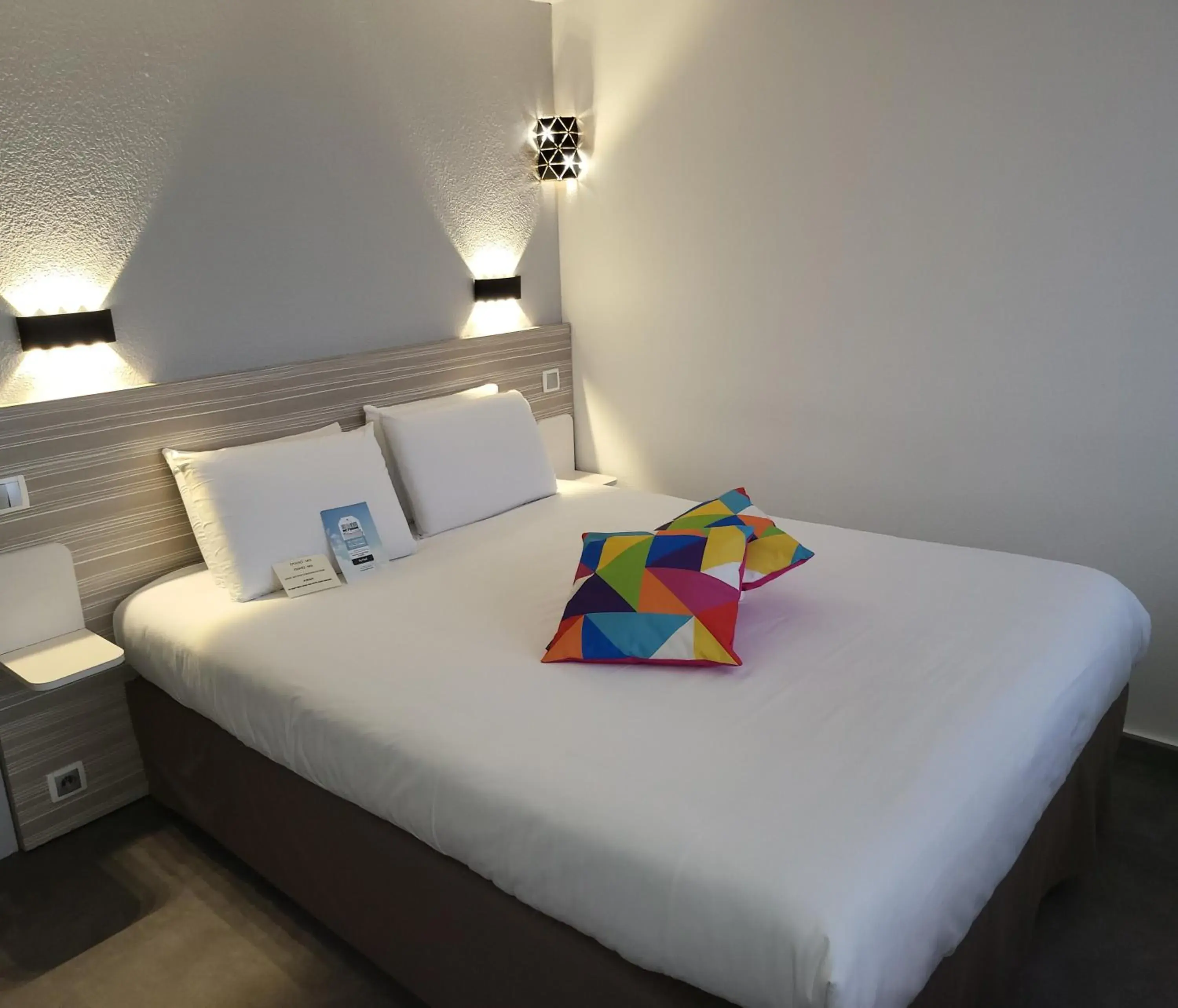 Bed in Kyriad Bellegarde - Genève Bed in Kyriad Bellegarde - Genève