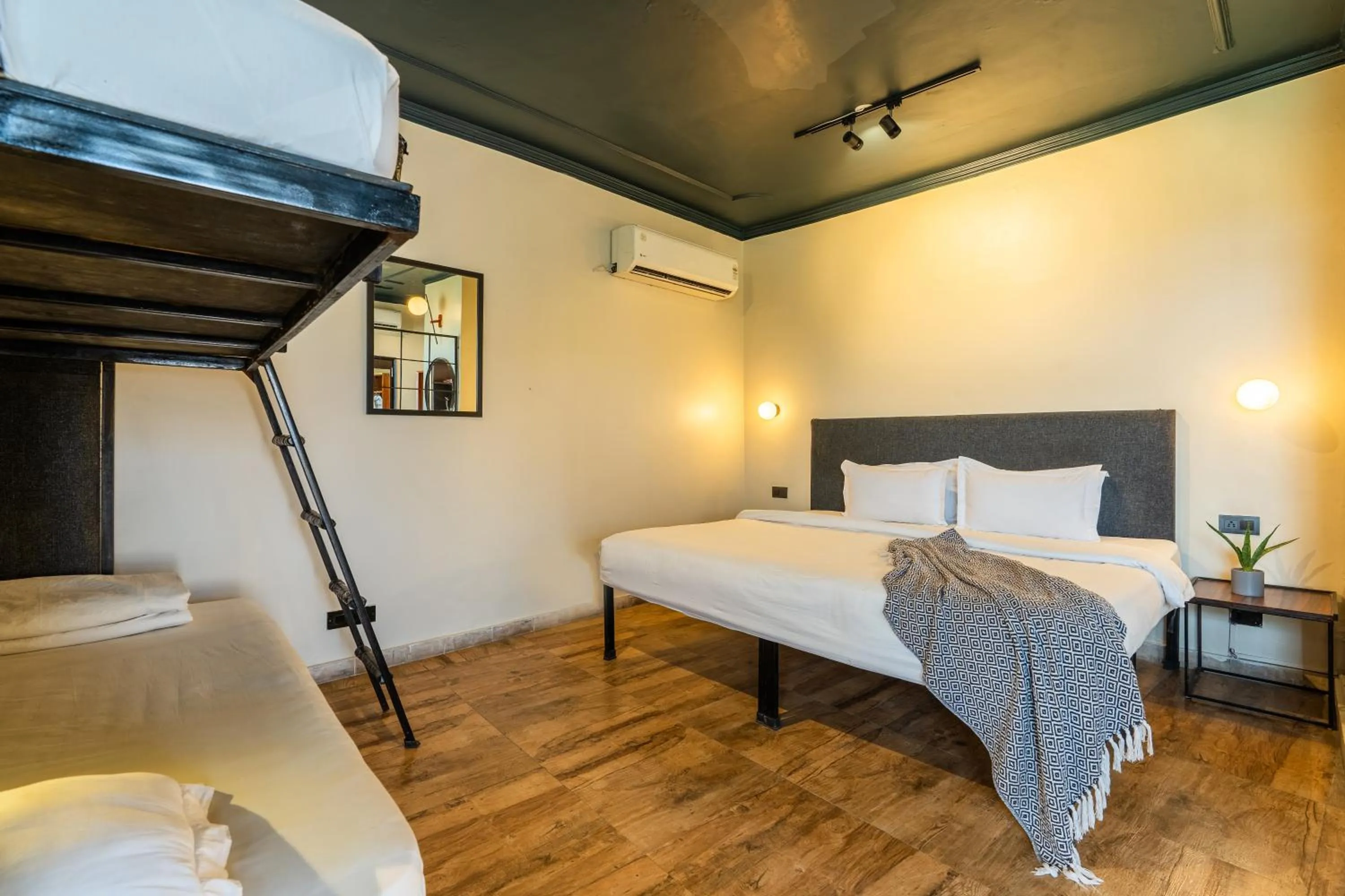 Bed in Minimalist One Hauz Khas Village