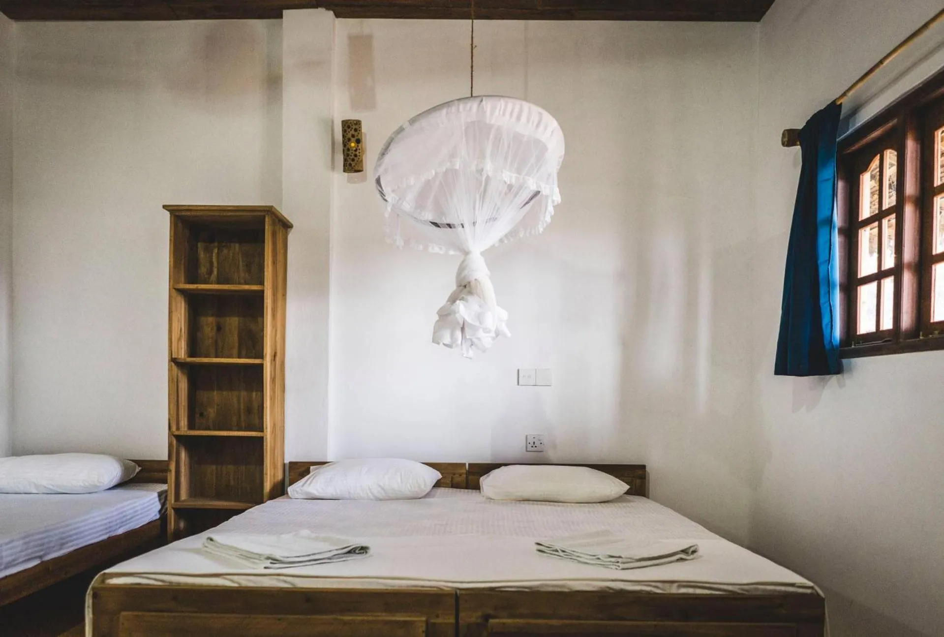 Bed in Surfpoint Sri Lanka Kite Village