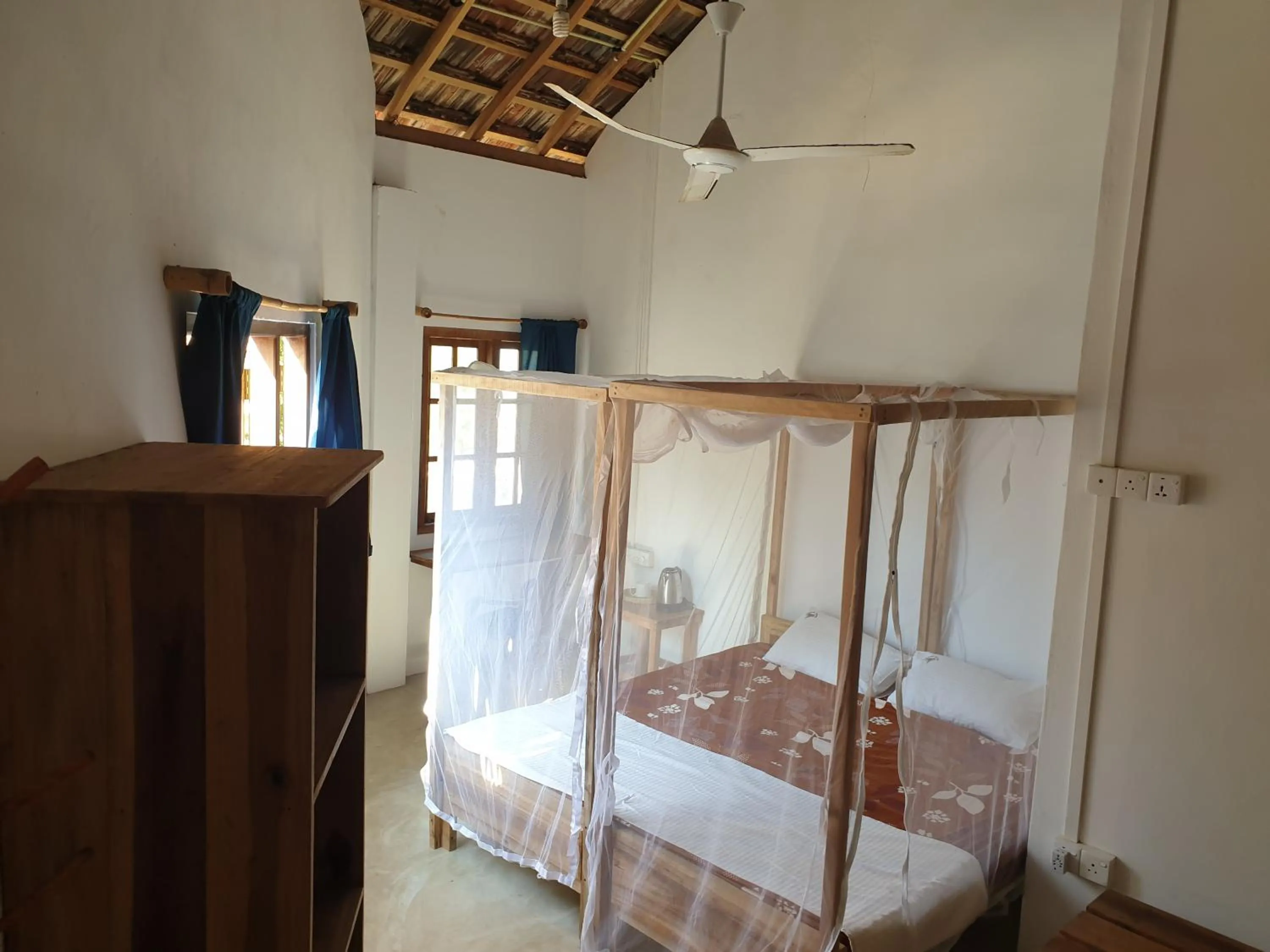 Bed in Surfpoint Sri Lanka Kite Village