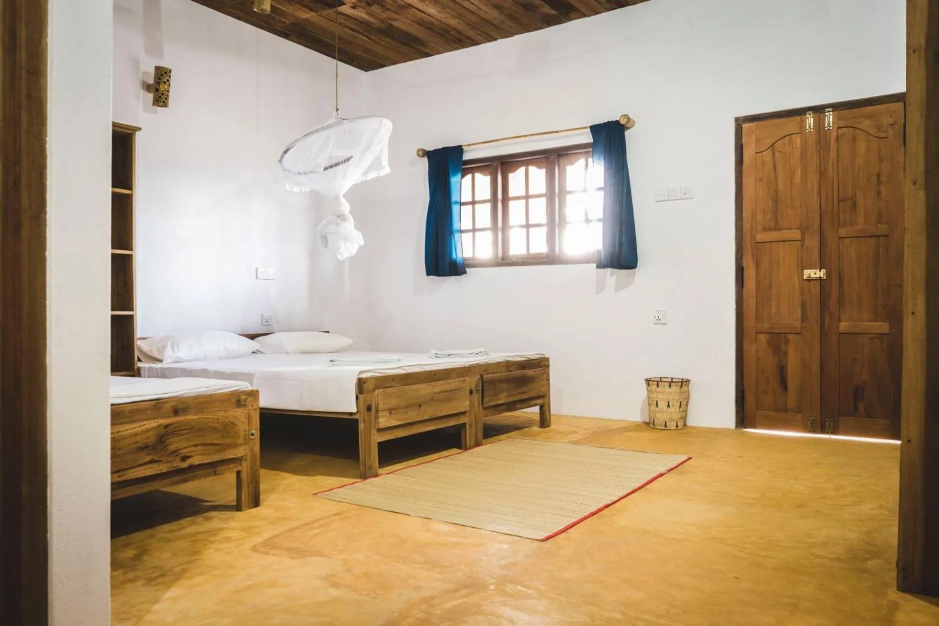 Bed in Surfpoint Sri Lanka Kite Village