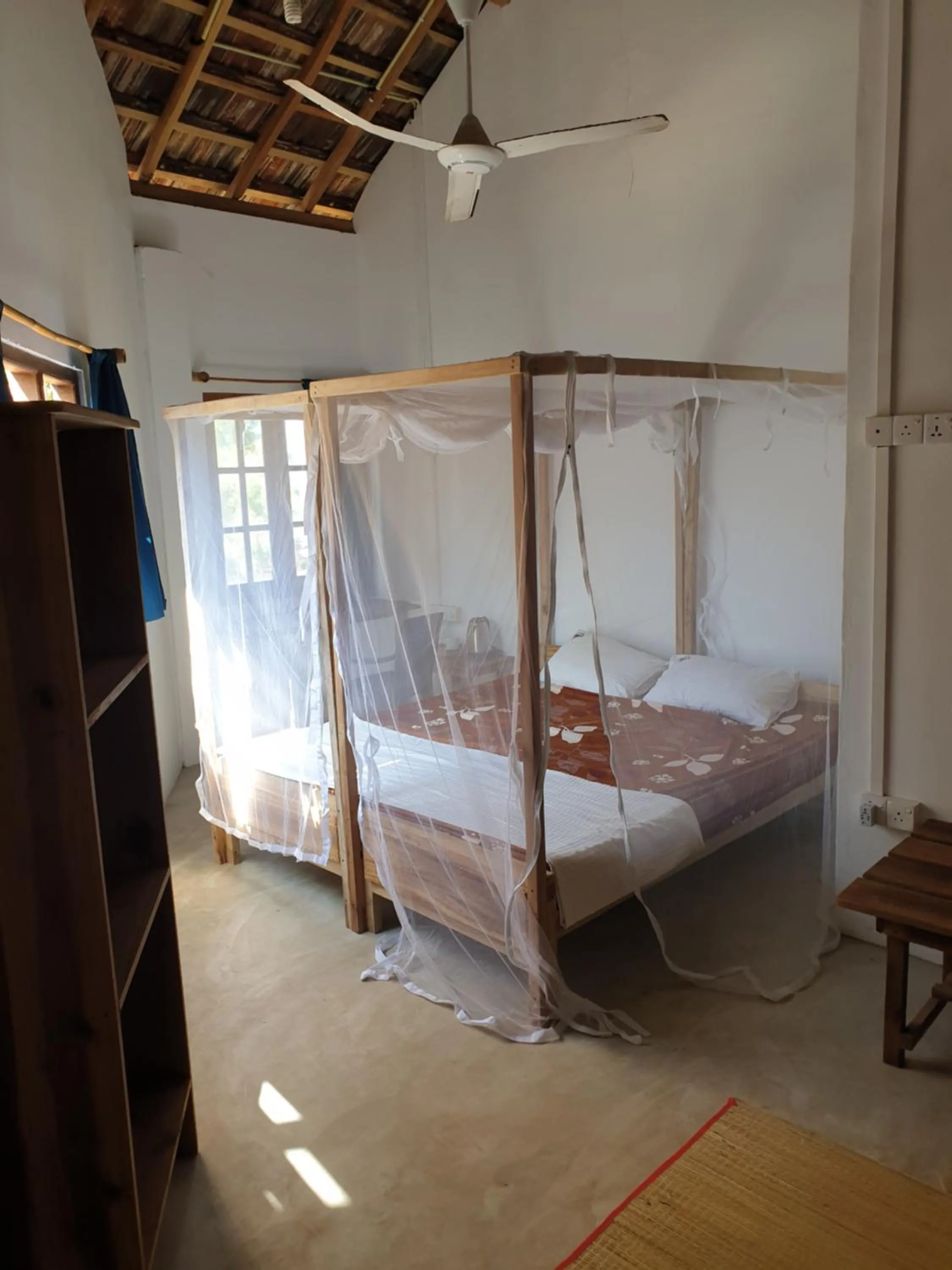 Bed in Surfpoint Sri Lanka Kite Village