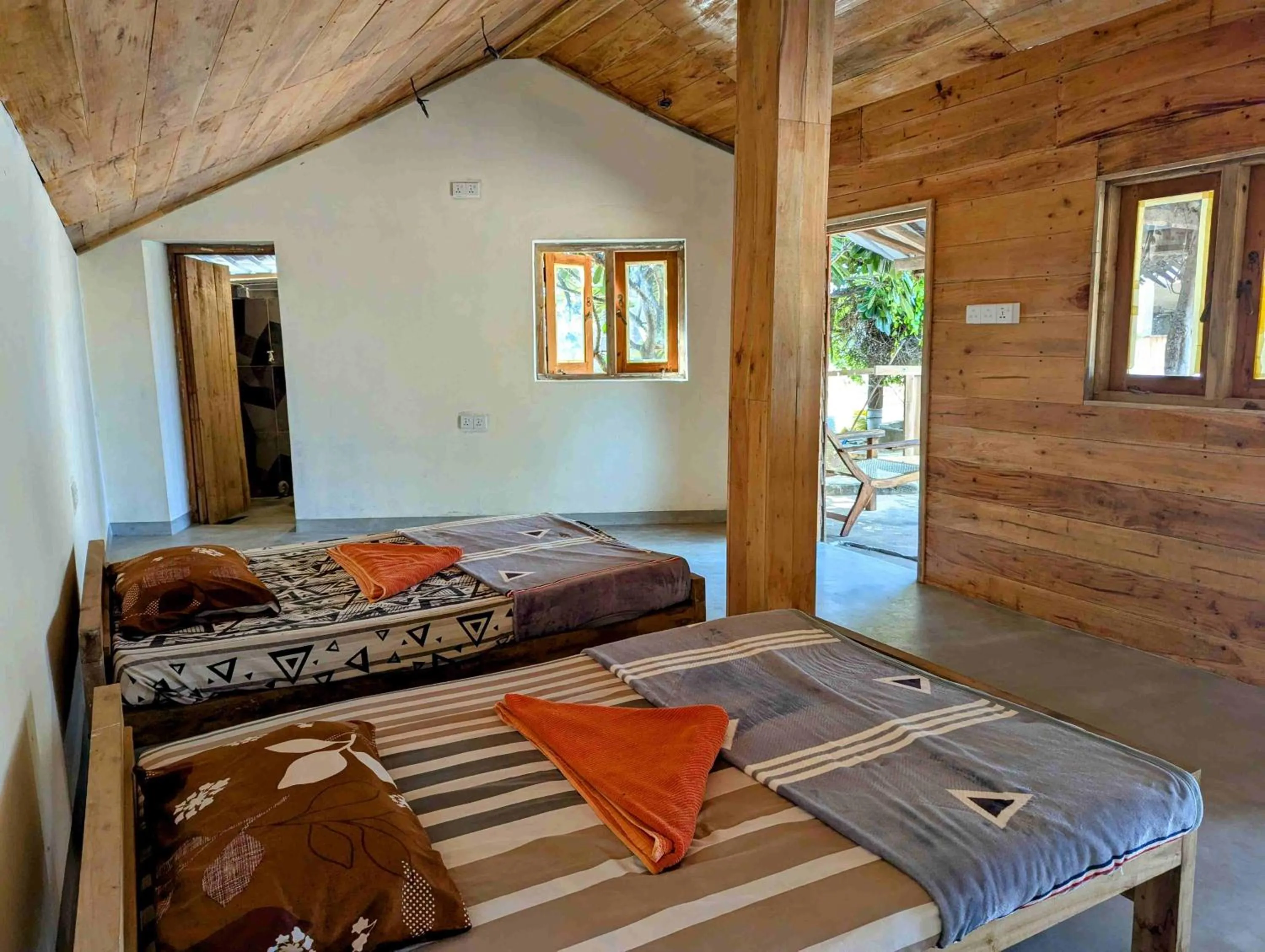 Bed in Surfpoint Sri Lanka Kite Village