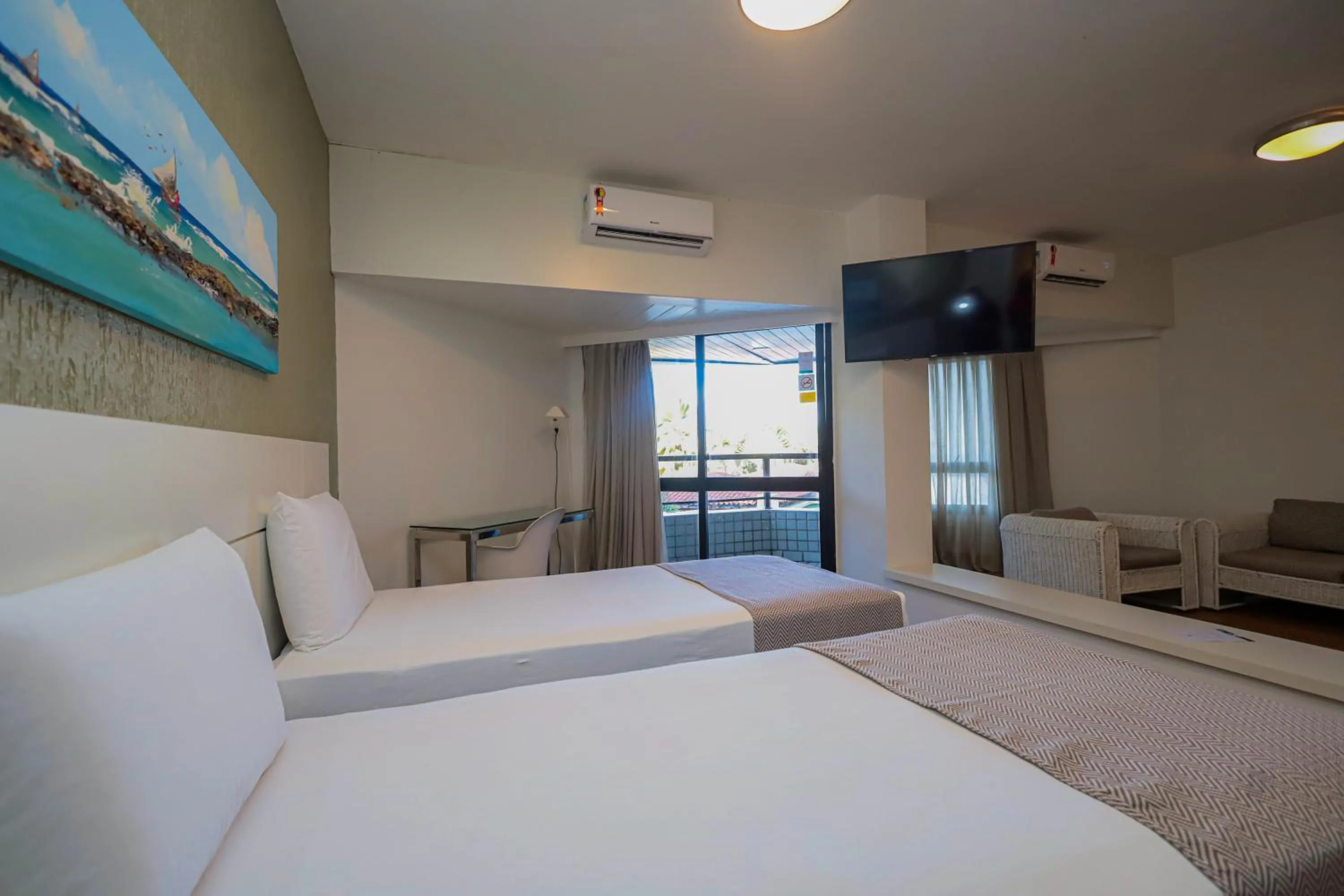 Bed in Maceió Atlantic Suites