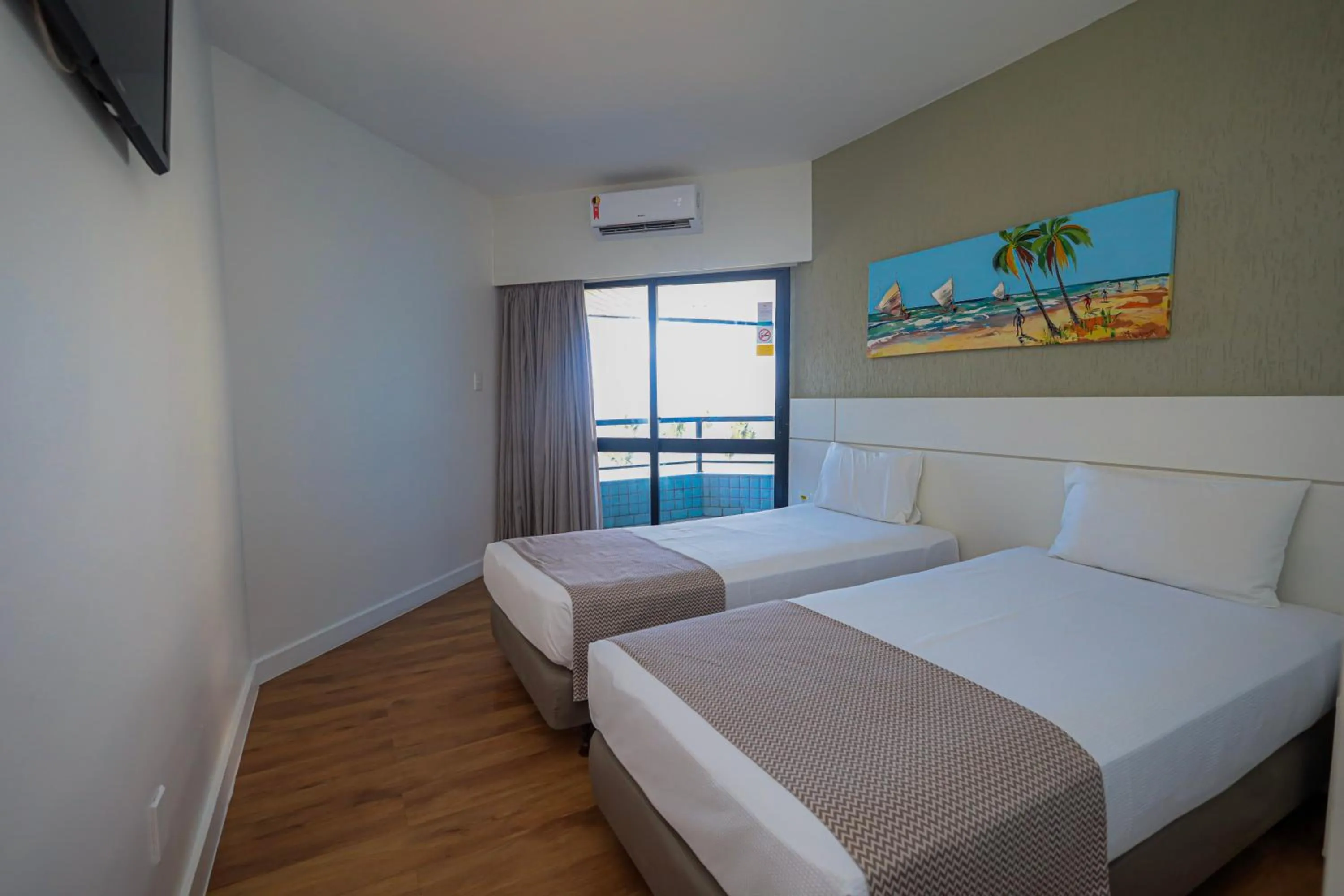 Bed in Maceió Atlantic Suites