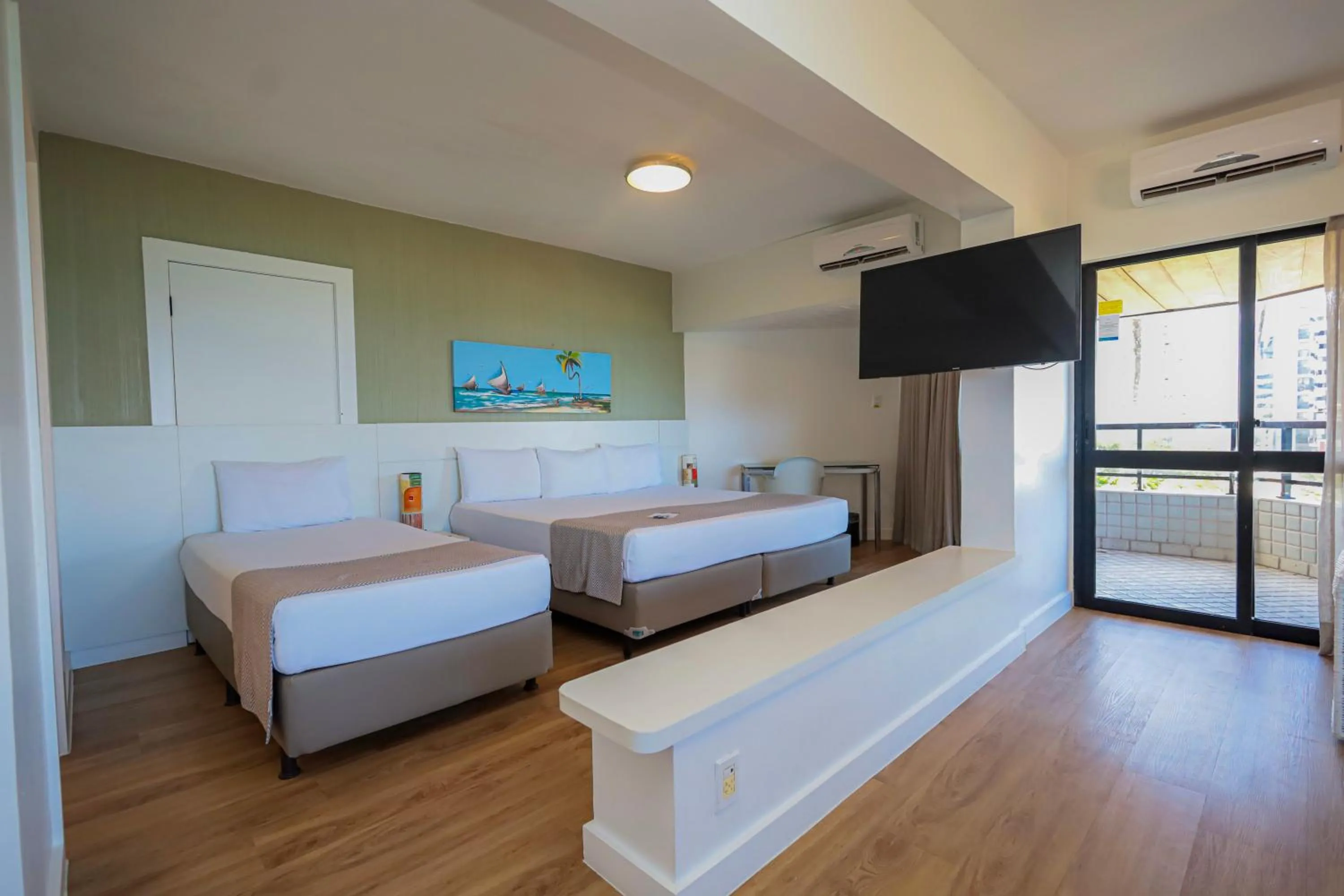 Bed in Maceió Atlantic Suites