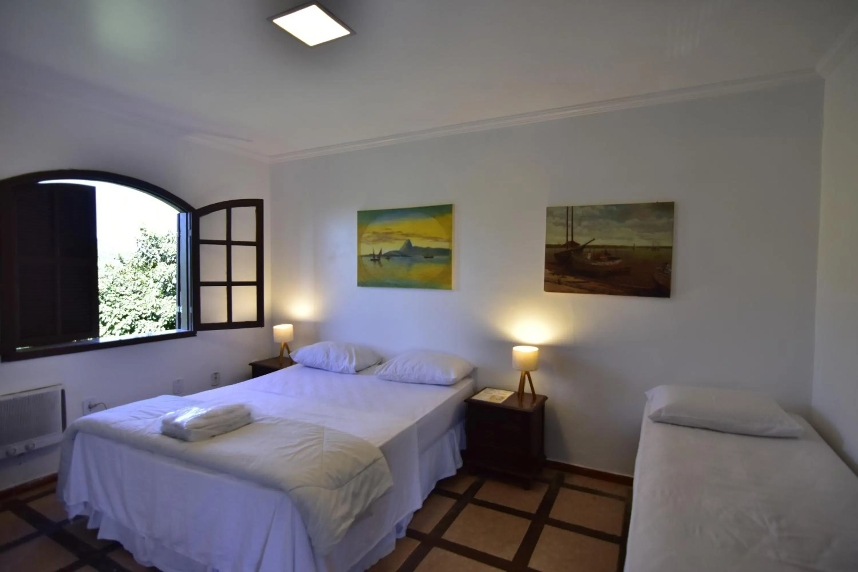 Bed in Pousada Tanto Mar