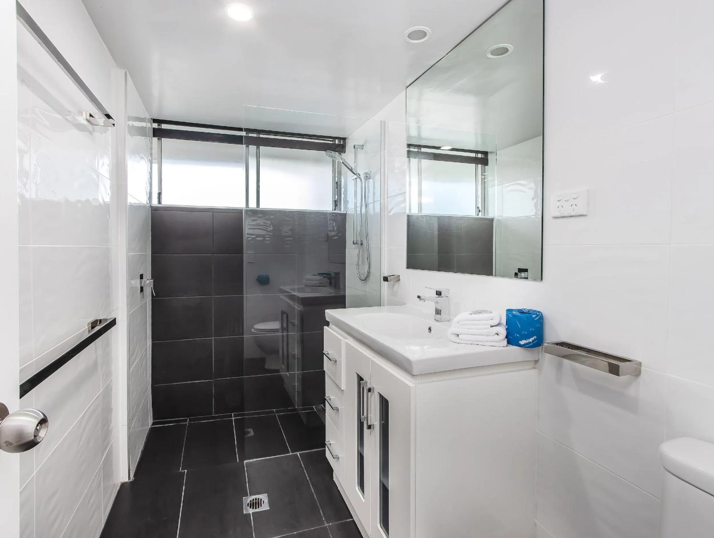 Shower in Baronnet Apartments