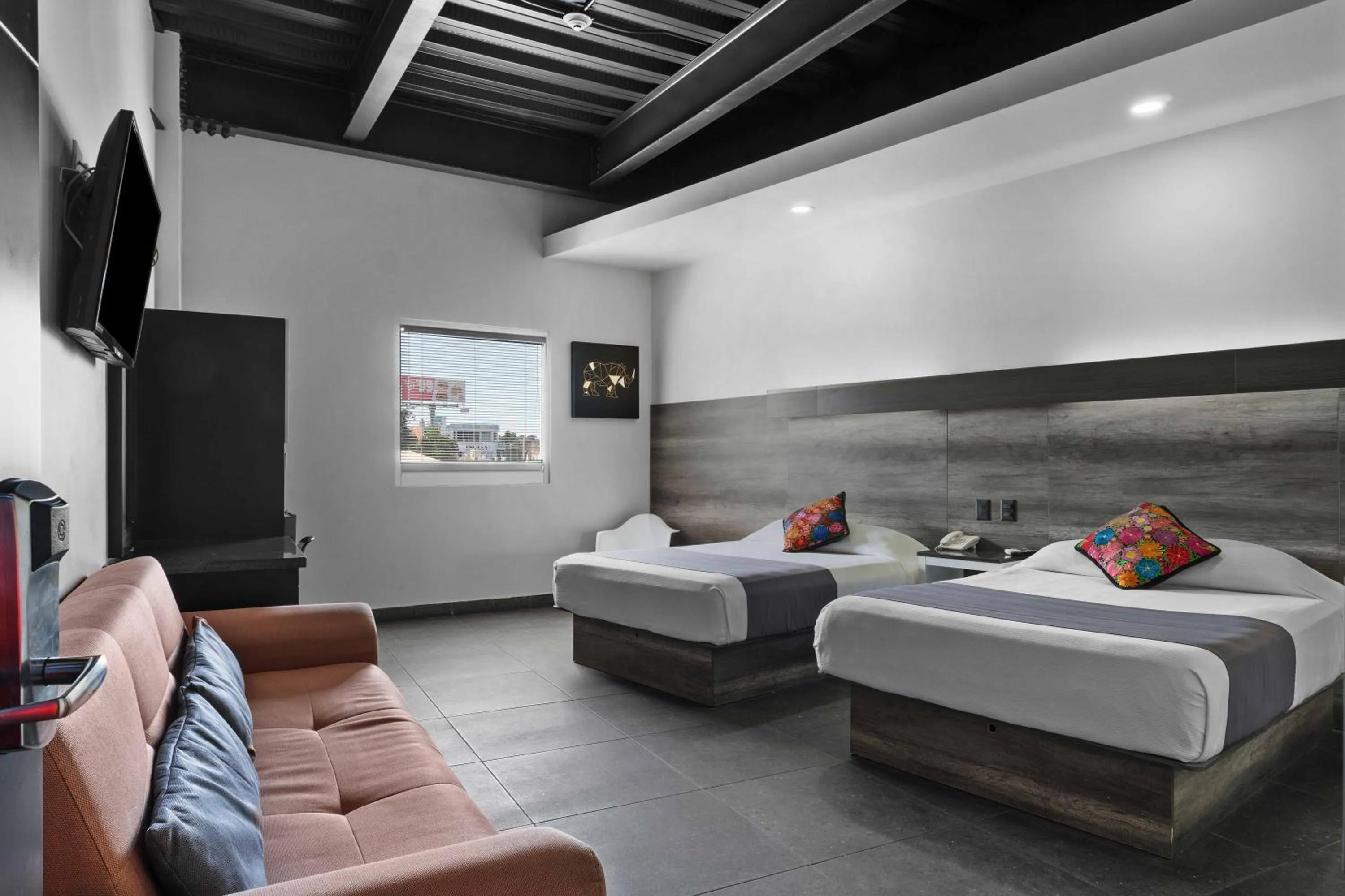 Bed in Homesuites Malecon