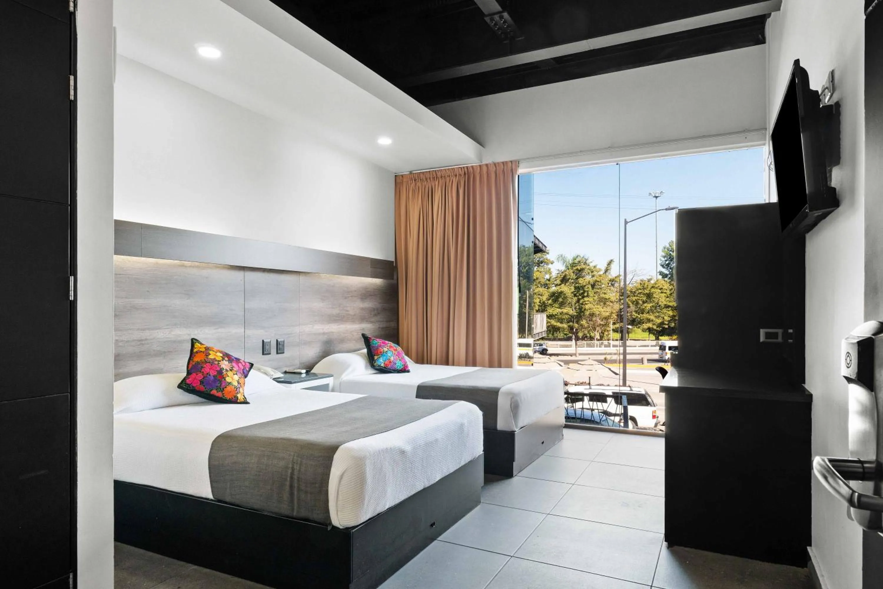 View (from property/room), Bed in Homesuites Malecon