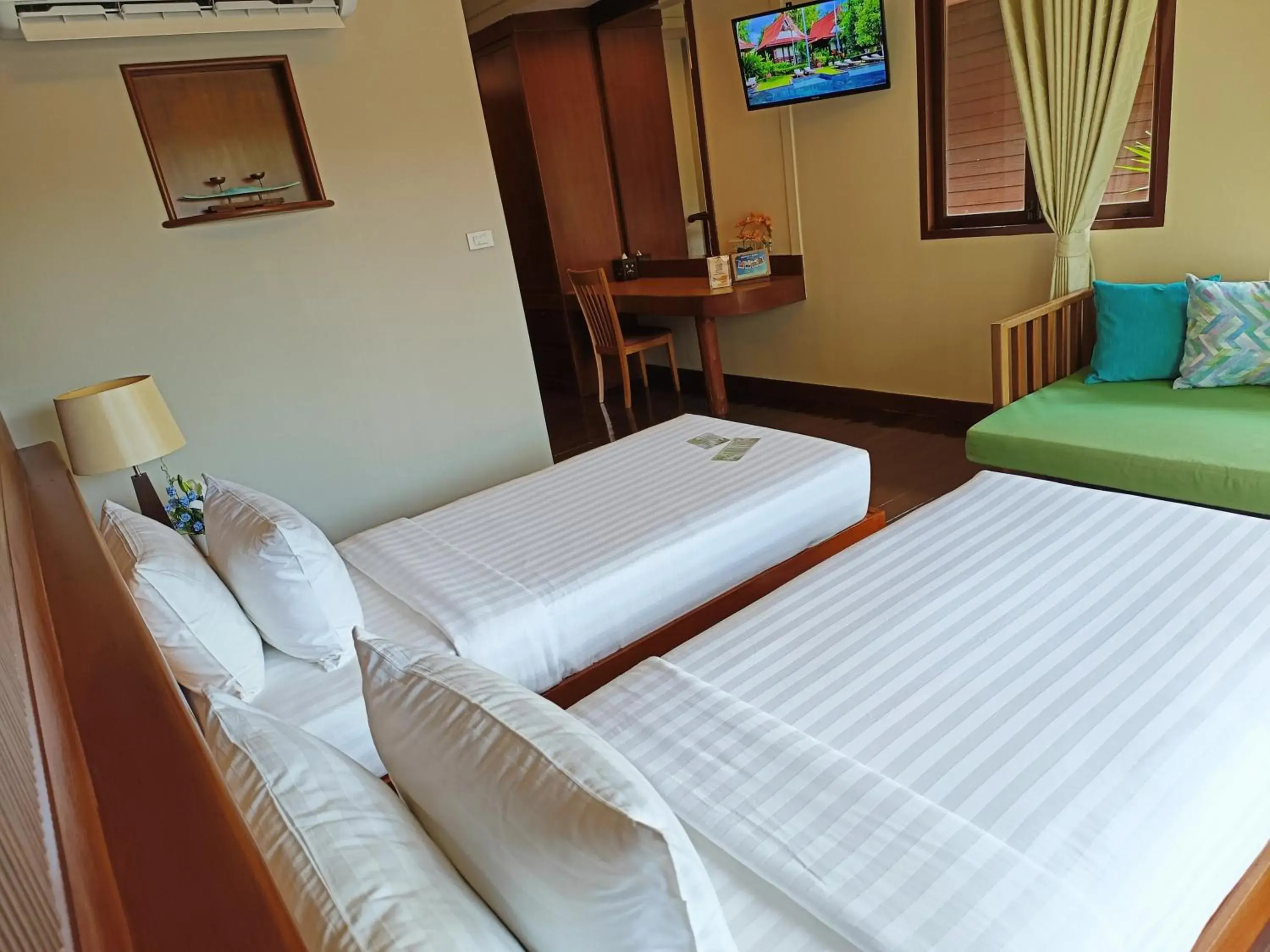 Bed in Baan Duangkaew Resort Bed in Baan Duangkaew Resort