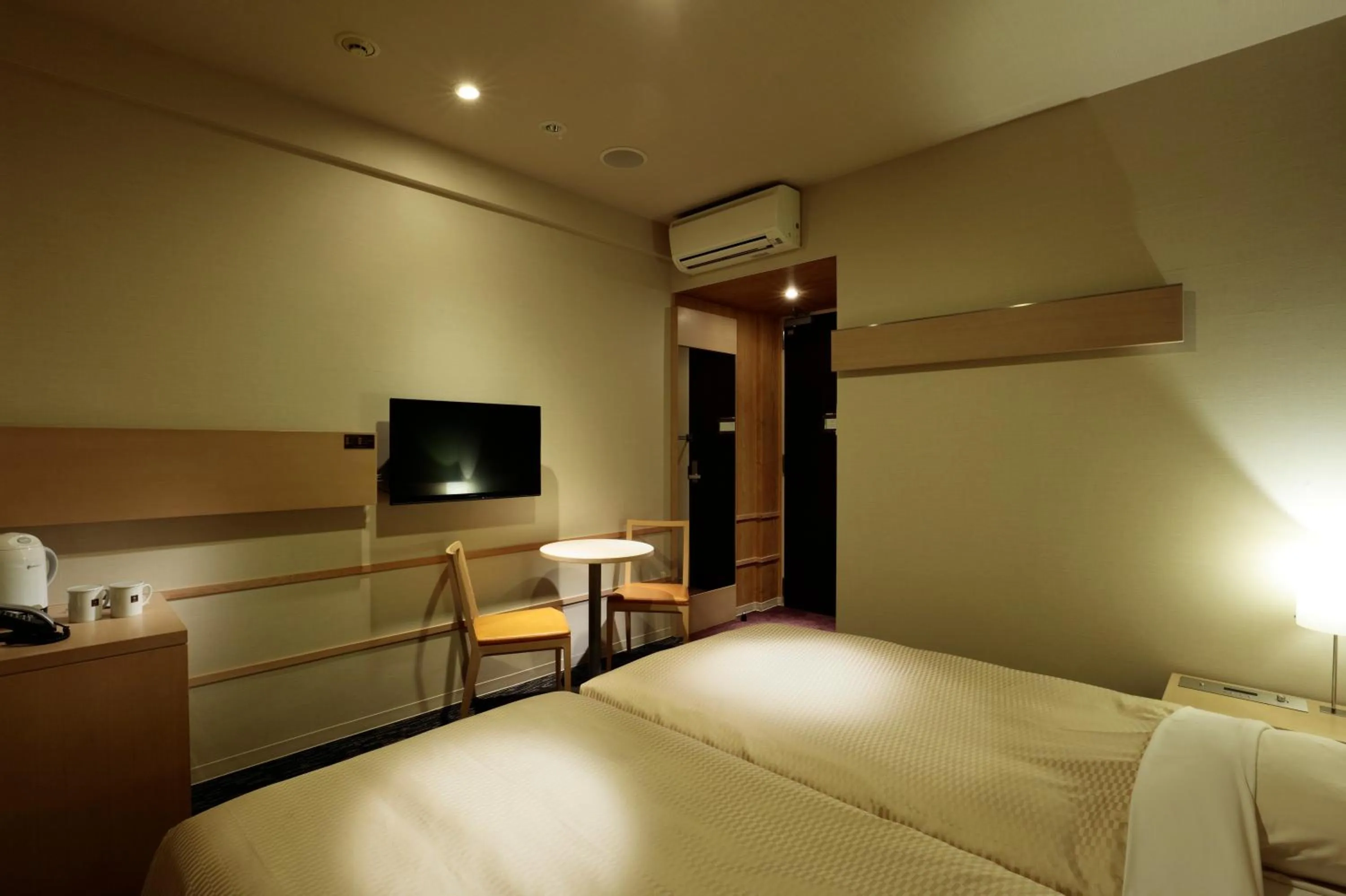 Bed in Candeo Hotels Shizuoka Shimada